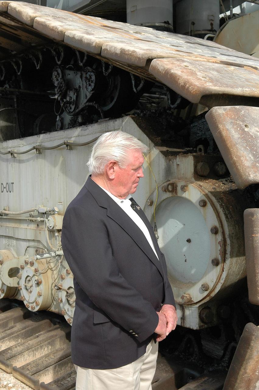 KENNEDY SPACE CENTER, FLA. - On the occasion of the 40th anniversary of the crawler transporter used for moving space shuttles to the NASA Kennedy Space Center’s launch pads, former crawler driver Fred Renaud gets a close look at one of the crawlers still in use. Media representatives and invited guests had the opportunity to tour one of NASA's two crawlers. This included the driver cab and engine room. Guests included current drivers and operators, as well as drivers from the Apollo Program. In January 1966, the crawler completed its first successful move with a 10.6-million-pound launch umbilical tower. It moved three-quarters of a mile in about nine hours. Throughout 40 years of service, the two crawlers have moved more than 3,500 miles and carried seven vehicles.