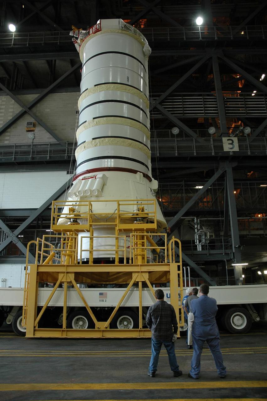KENNEDY SPACE CENTER, FLA.  —   The right aft booster, comprised of the aft skirt and the aft motor segment, is ready to be lifted onto the mobile launcher platform inside the Vehicle Assembly Building.  The booster is being assembled for the space shuttle Discovery on mission STS-121, the second space shuttle mission in the return-to-flight sequence. The booster assembly is a major milestone in the processing sequence that leads to launch.  The launch date is targeted no earlier than May.  Photo credit:  NASA/Jack Pfaller