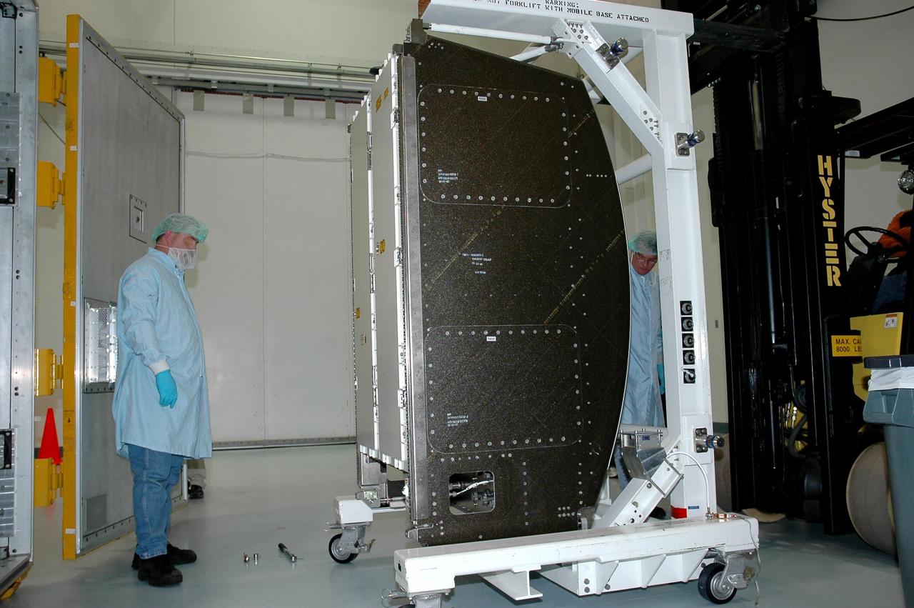 KENNEDY SPACE CENTER, FLA.  — At NASA Kennedy Space Center, a new environmental control and life support system is moved into the Space Station Processing Facility.  The life support system is part of the payload on the second return-to-flight test mission, STS-121, aboard space shuttle Discovery to the International Space Station.  The system will add to the station’s oxygen-making capabilities and could provide enough oxygen for up to six people.  Managed by Marshall Space Flight Center in Huntsville, the system was built by Hamilton Sundstrand Corp. in Connecticut.  Discovery will carry more than two tons of equipment and supplies to the station.  This second return-to-flight test mission is to carry on analysis of safety improvements that debuted on the first return-to-flight mission, STS-114, and build upon those tests.  The launch is targeted for a date no earlier than May. Photo credit: NASA/Jack Pfaller