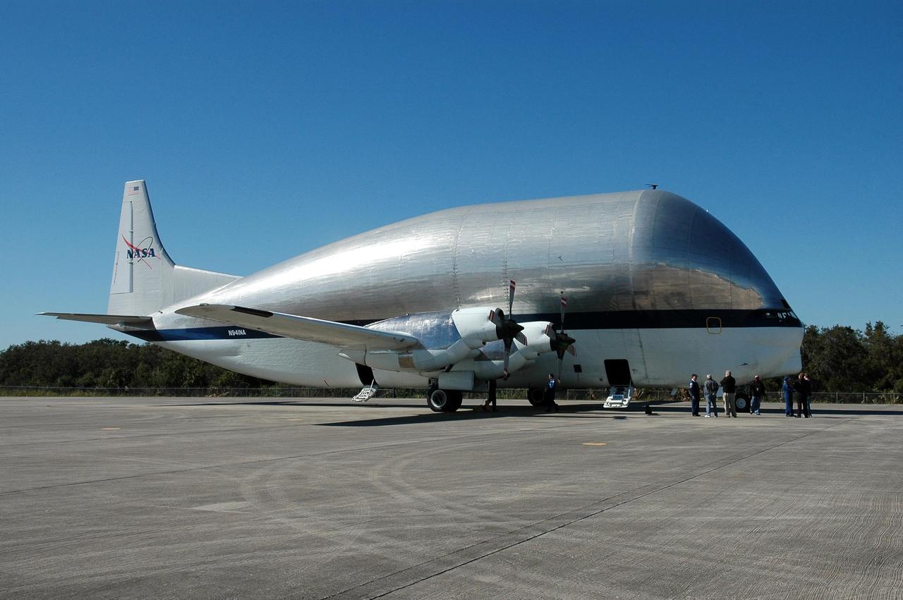 KENNEDY SPACE CENTER, FLA. -   This Super Guppy aircraft is parked on NASA Kennedy Space Center’s Shuttle Landing Facility after landing.  It has flown to the Center to pick up and transport the common module structural test element to NASA's Marshall Space Flight Center in Huntsville, Ala.  The common module is an aluminum canister used as a structural test element for an actual Space Station flight element.  At Marshall, the module will be used to conduct advanced environmental control and life support testing for future NASA exploration missions. The Super Guppy aircraft has a unique hinged nose that can open more than 200 degrees, allowing large pieces of cargo to be loaded and unloaded from the front. Guppy aircraft were used in several past space programs, including Gemini, Apollo and Skylab, to transport spacecraft components. NASA personnel at Ellington Field outfitted the Super Guppy with a specially designed cradle to be used when carrying International Space Station components.  The first Guppy aircraft was developed in 1962, designed specifically for NASA operations by Aero Spacelines of California. Photo credit: NASA/Kim Shiflett