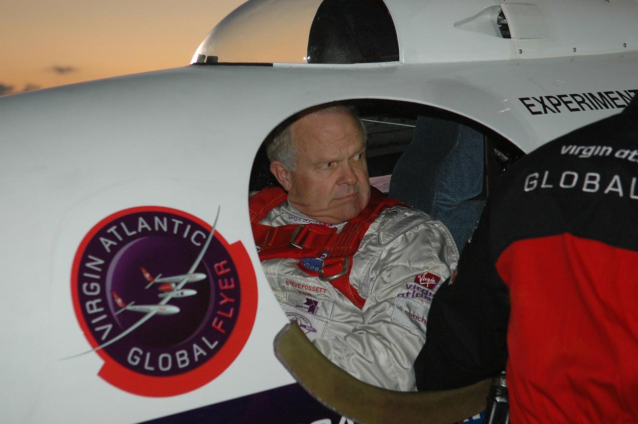 KENNEDY SPACE CENTER, FLA. -   At NASA Kennedy Space Center’s Shuttle Landing Facility, Steve Fossett is strapped into the cockpit of the Virgin Atlantic GlobalFlyer waiting for takeoff. Fossett will pilot the GlobalFlyer on a record-breaking attempt by flying solo, non-stop without refueling, to surpass the current record for the longest flight of any aircraft. This is the second attempt in two days after a fuel leak was detected Feb. 7.  The expected time of takeoff is 7 a.m.  Photo credit: NASA/Kim Shiflett