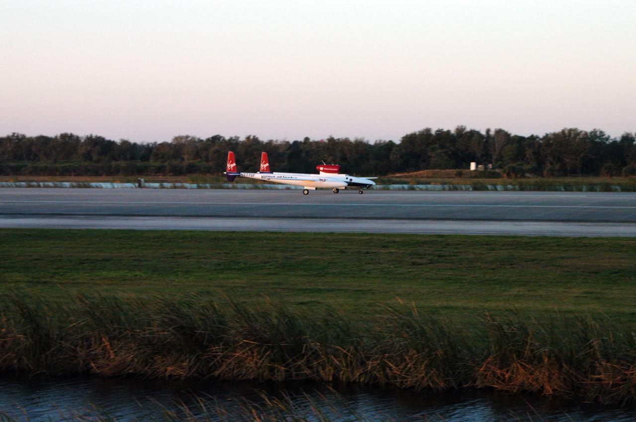 KENNEDY SPACE CENTER, FLA. -    On NASA Kennedy Space Center’s Shuttle Landing Facility runway, the Virgin Atlantic GlobalFlyer, piloted by Steve Fossett, begins its takeoff. Fossett is attempting a record-breaking solo flight, non-stop without refueling, to surpass the current record for the longest flight of any aircraft. This is the second attempt in two days after a fuel leak was detected Feb. 7.  The actual launch time was 7:22 a.m. Feb. 8.  Photo credit: NASA/George Shelton