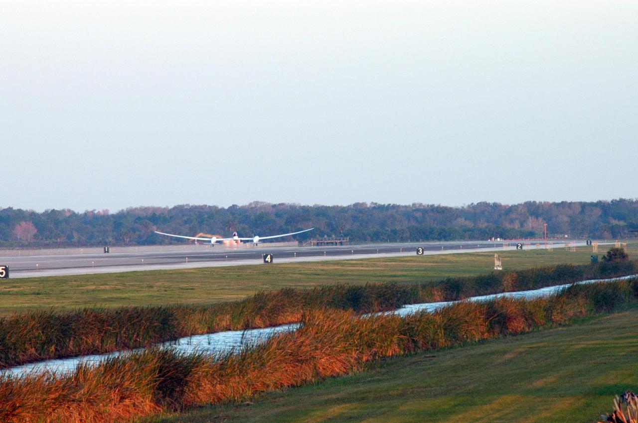 KENNEDY SPACE CENTER, FLA. -    On NASA Kennedy Space Center’s Shuttle Landing Facility runway, the Virgin Atlantic GlobalFlyer, piloted by Steve Fossett, begins its takeoff.  Fossett is attempting a record-breaking solo flight, non-stop without refueling, to surpass the current record for the longest flight of any aircraft. This is the second attempt in two days after a fuel leak was detected Feb. 7.  The actual launch time was 7:22 a.m. Feb. 8.  Photo credit: NASA/George Shelton