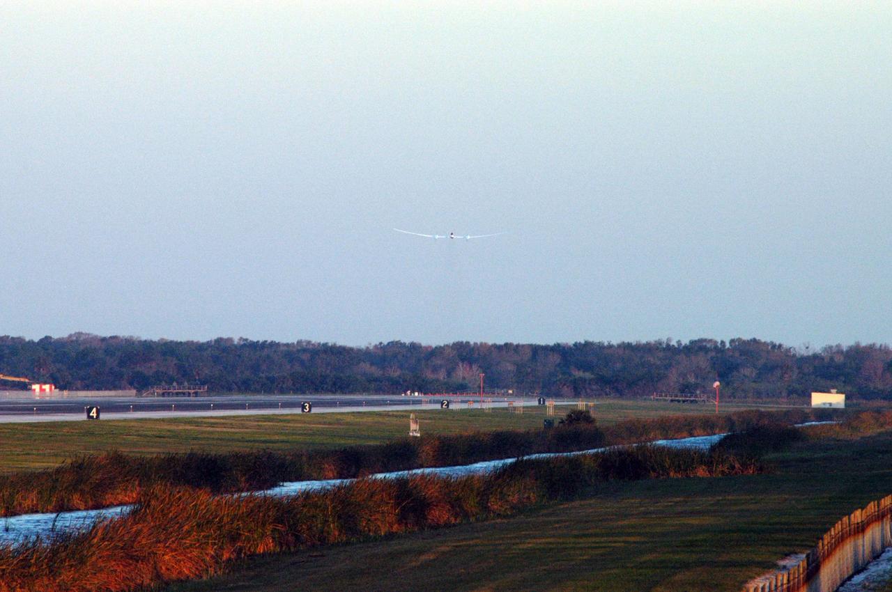 KENNEDY SPACE CENTER, FLA. -   With little runway to spare, the Virgin Atlantic GlobalFlyer, piloted by Steve Fossett, is airborne from NASA Kennedy Space Center’s Shuttle Landing Facility.  Fossett is attempting a record-breaking solo flight, non-stop without refueling, to surpass the current record for the longest flight of any aircraft. This is the second attempt in two days after a fuel leak was detected Feb. 7.  The actual launch time was 7:22 a.m. Feb. 8.  Photo credit: NASA/George Shelton