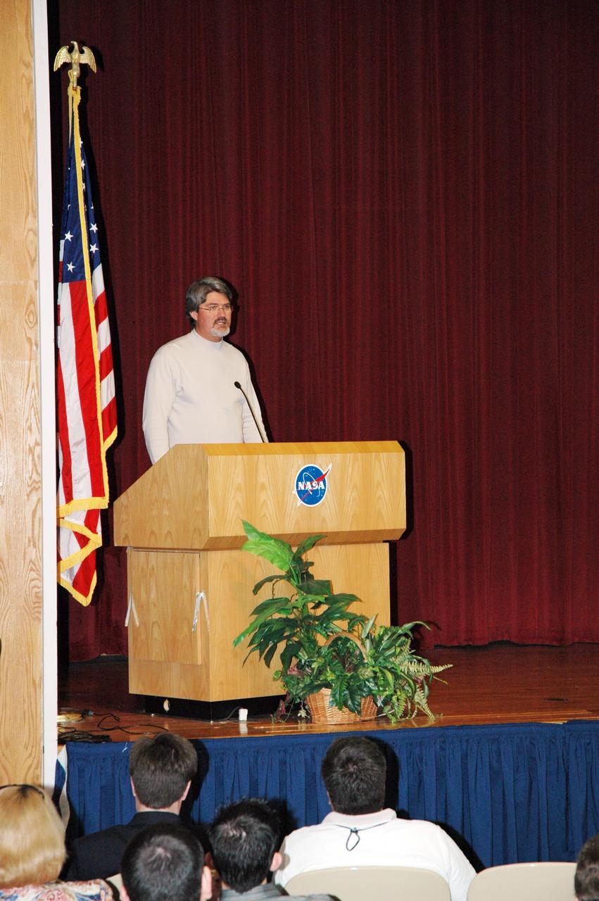 KENNEDY SPACE CENTER, FLA. - In the training auditorium at NASA's Kennedy Space Center, Deputy Director Bill Parsons, at the beginning of a space shuttle all hands meeting, speaks to employees about his journey through NASA.  He was followed by Space Shuttle Program Manager Wayne Hale discussed the status of the program, successes of the STS-114 mission, effects of Hurricane Katrina on NASA facilities, and the newly released budget.  Photo credit: NASA/Jim Grossmann