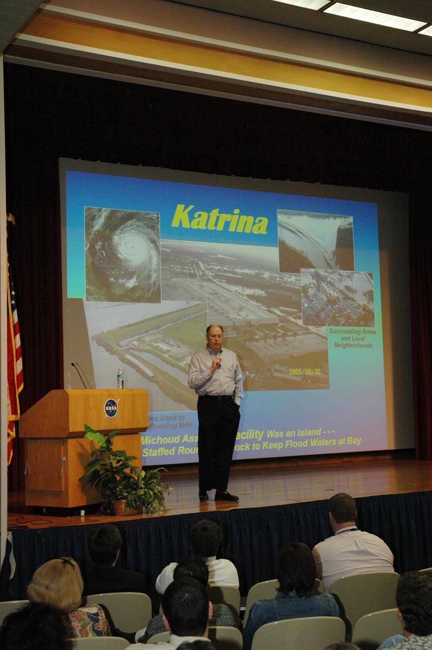 KENNEDY SPACE CENTER, FLA. - At a space shuttle all hands meeting in the training auditorium at NASA's Kennedy Space Center, Space Shuttle Program Manager Wayne Hale discusses effects of Hurricane Katrina on NASA facilities, the status of the program, successes of the STS-114 mission, and the newly released budget.  Photo credit:  NASA/Jim Grossmann