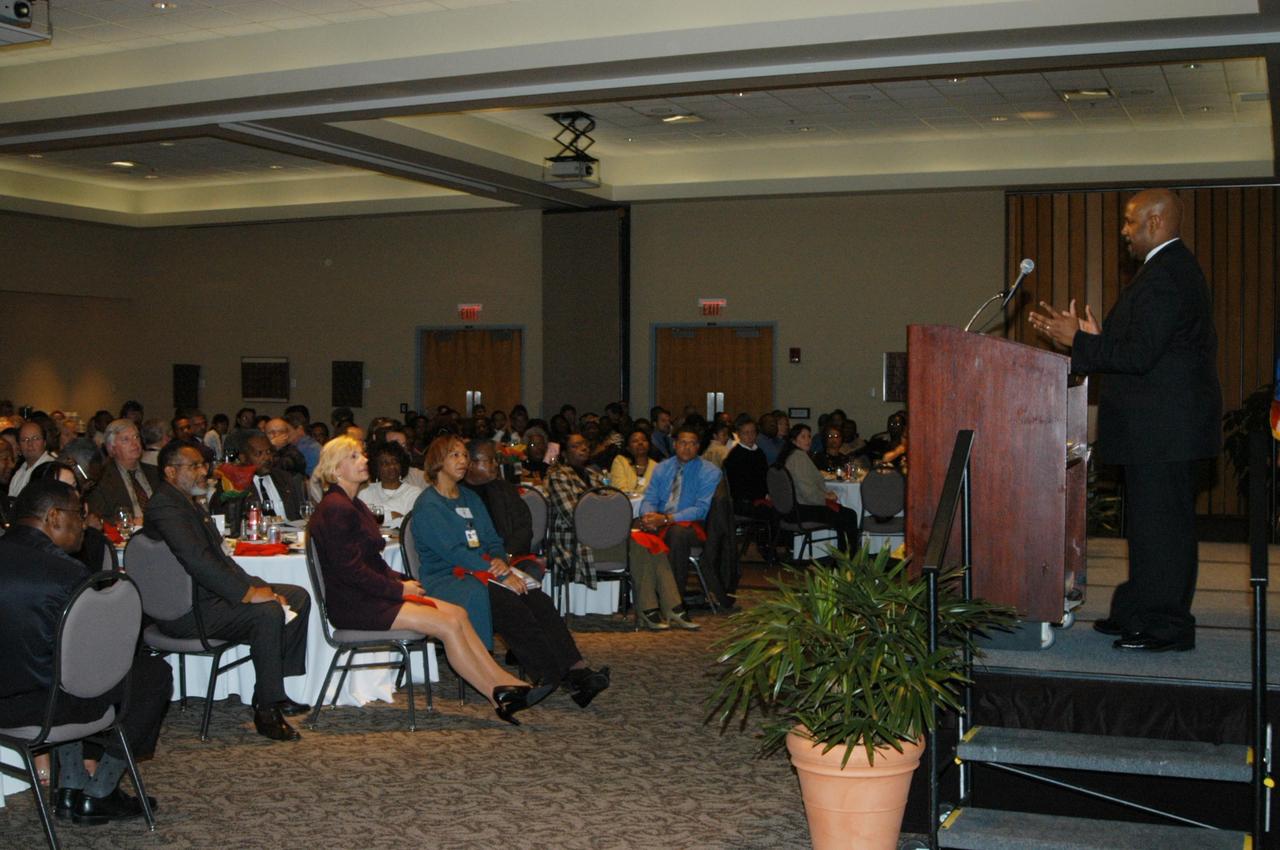 KENNEDY SPACE CENTER, FLA. -  At the dais (right), Kwatsi Alibaruho speaks to guests at NASA Kennedy Space Center's annual BEST (Black Employee Strategy Team) African-American History Month luncheon.  Among attendees was Center Director Jim Kennedy.  The guest speaker for the luncheon, Alibaruho is a flight director from Johnson Space Center Mission Control.  The theme for this year's luncheon was "Creating New Paths From Journeys Past."  The luncheon was held in the Kurt H. Debus Center at Kennedy Space Center's Visitor Complex.  Photo credit: NASA/George Shelton