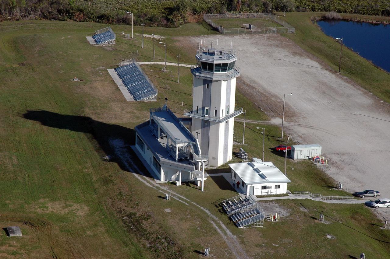 KENNEDY SPACE CENTER, FLA.  -  This view shows the NASA control tower at the NASA Kennedy Space Center's Shuttle Landing Facility. The site includes viewing stands at media resources inside the building in front of the tower.  Photo credit: Cory Huston