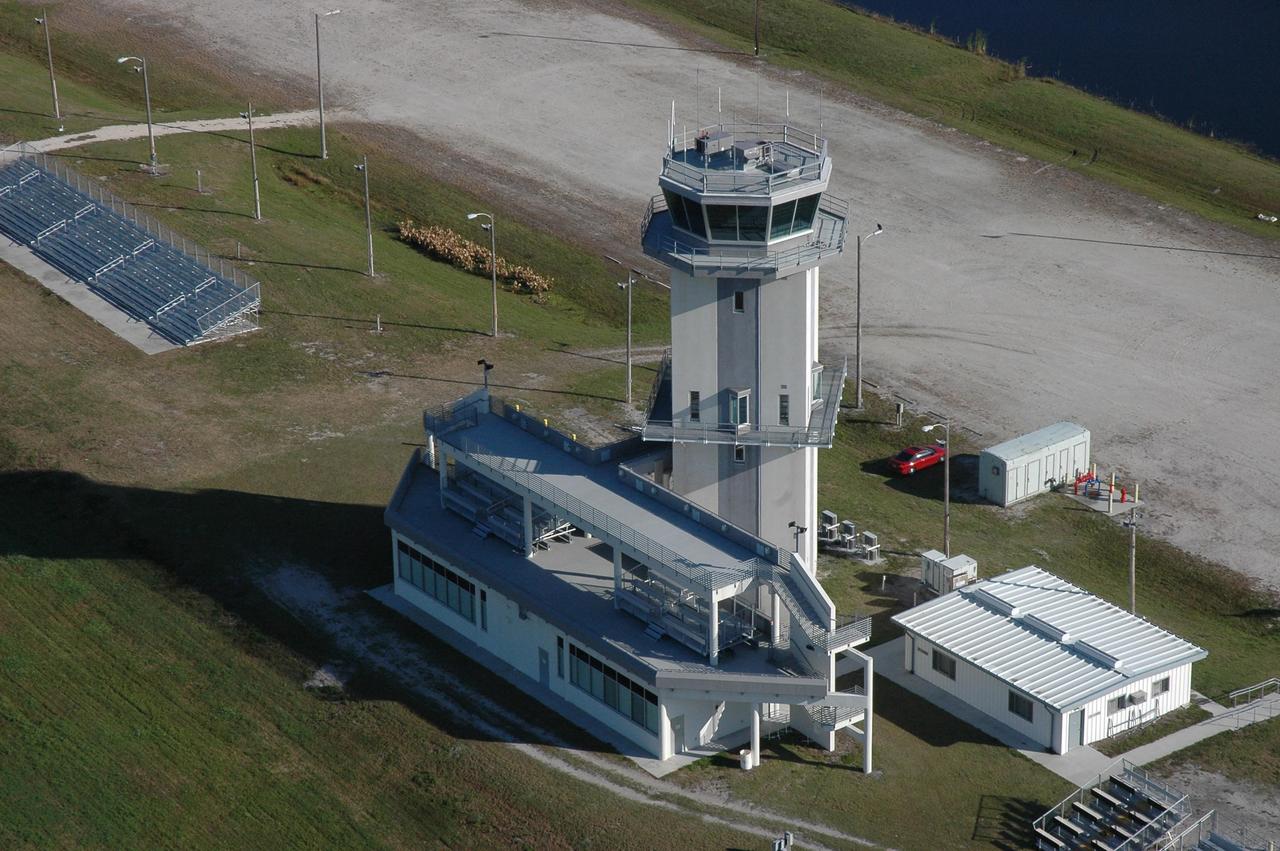 KENNEDY SPACE CENTER, FLA.  -   This view shows the NASA control tower at the NASA Kennedy Space Center's Shuttle Landing Facility. The site includes viewing stands at media resources inside the building in front of the tower.  Photo credit: Cory Huston