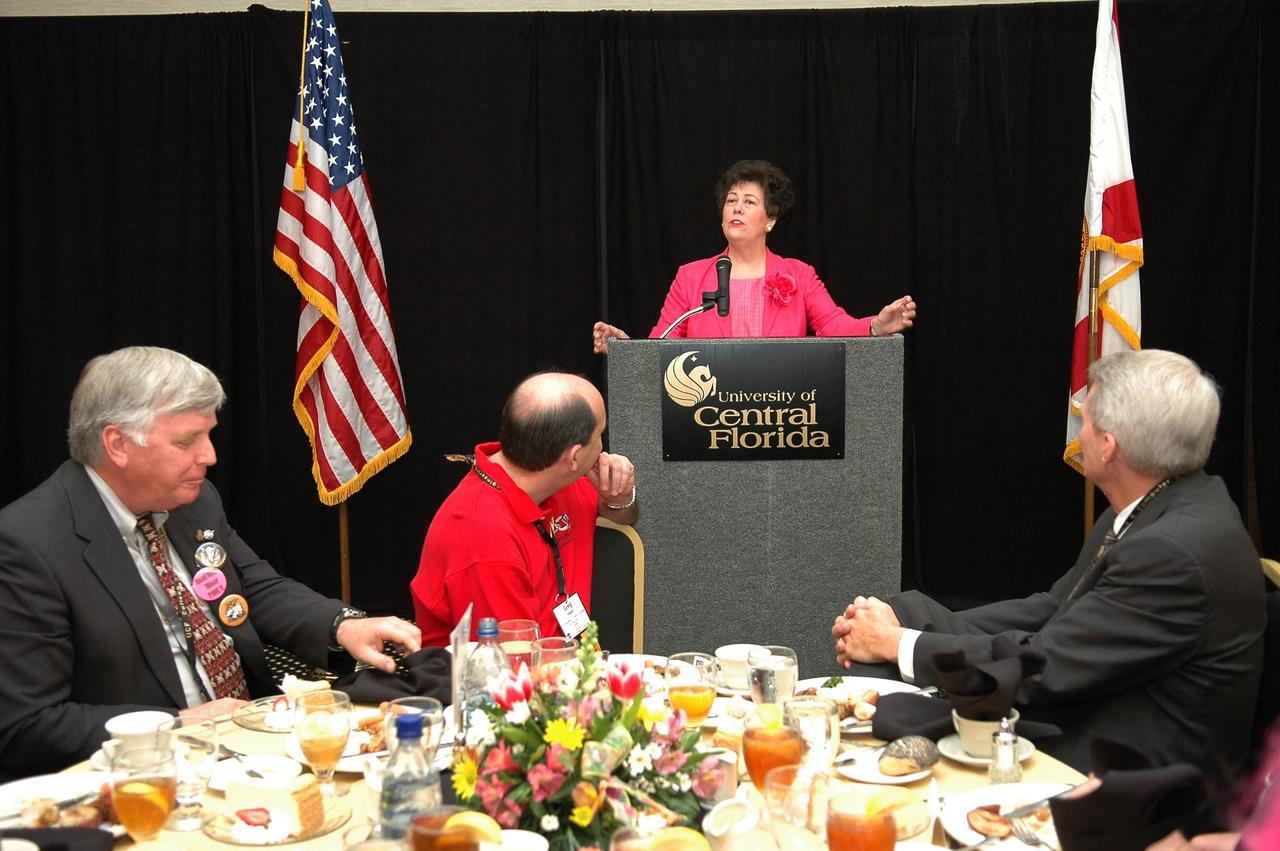 KENNEDY SPACE CENTER, FLA. - Florida's Lt. Governor Toni Jennings speaks during the V.I.P. luncheon at the 2006 FIRST Robotics Regional Competition held March 9-11 at the University of Central Florida in Orlando. The FIRST Robotics Competition challenges teams of young people and their mentors to solve a common problem in a six-week timeframe using a standard "kit of parts" and a common set of rules. Teams build robots from the parts and enter them in a series of competitions. FIRST, which is based on "For Inspiration and Recognition of Science and Technology," redefines winning for these students. Teams are rewarded for excellence in design, demonstrated team spirit, gracious professionalism and maturity, and ability to overcome obstacles. Scoring the most points is a secondary goal. Winning means building partnerships that last. NASA and the University of Central Florida are co-sponsors of the regional event, which this year included more than 50 teams. Photo credit: NASA/Kim Shiflett
