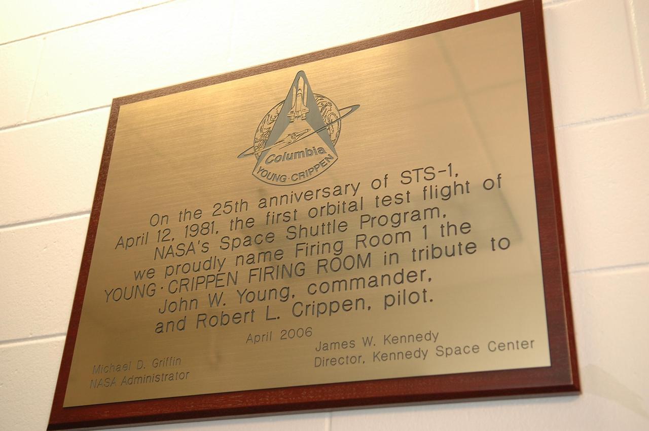 KENNEDY SPACE CENTER, FLA. - Near the door of firing room 1 in the Launch Control Center at NASA's Kennedy Space Center is this plaque revealing the dedication of the room as the Young · Crippen Firing Room. The renaming was made in tribute to the 25th anniversary of the first space shuttle flight on April 12, 1981, dedicating the firing room that launched the historic flight and the crew of STS-1, Commander John Young and Pilot Robert Crippen. Making the dedication were Center Director Jim Kennedy; the NASA test director for STS-1, Norm Carlson; and the project flight engineer for Space Shuttle Columbia, Bob Sieck. Photo credit: NASA/Kim Shiflett