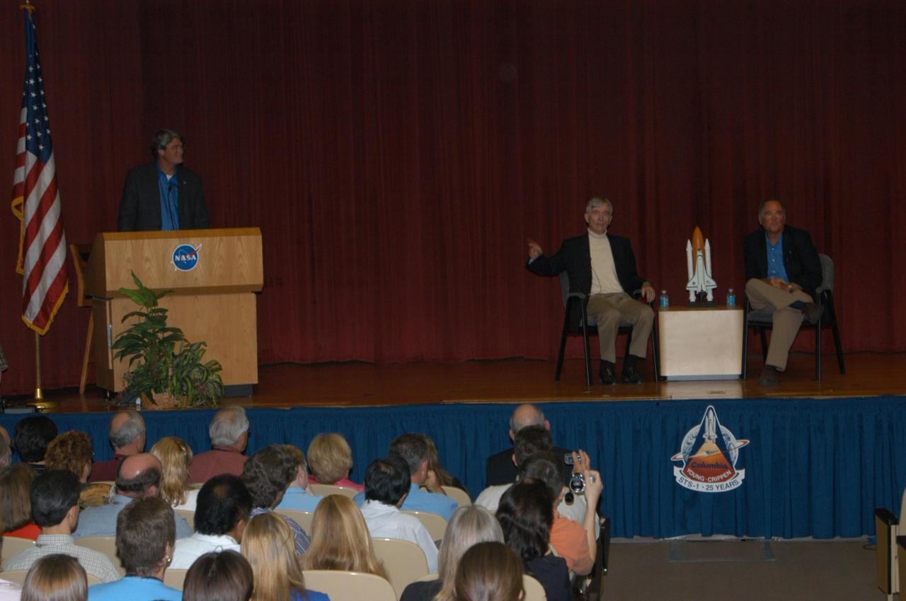 KENNEDY SPACE CENTER, FLA. - To honor the 25th anniversary of the first shuttle launch on April 12, 1981, STS-1 Commander John Young (left) and Pilot Bob Crippen (right) were invited to share their experiences with employees during a special presentation at Kennedy. Here, Young relates his feelings about making that historic flight. Photo credit: NASA/George Shelton