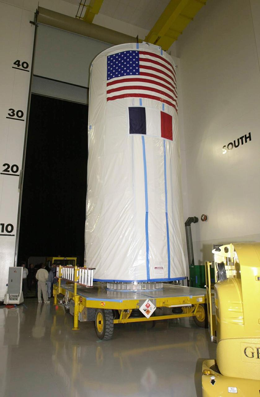 VANDENBERG AIR FORCE BASE, CALIF. - The CALIPSO/CloudSat spacecraft is in a transport canister ready for the move to Space Launch Complex 2. There it will be lifted and mated with a Boeing Delta II rocket for launch on April 21. CALIPSO stands for Cloud-Aerosol Lidar and Infrared Pathfinder Satellite Observation. It will fly in combination with the CloudSat satellite to provide never-before-seen 3-D perspectives of how clouds and aerosols form, evolve, and affect weather and climate. CALIPSO and CloudSat will join three other satellites in orbit to enhance understanding of climate systems.