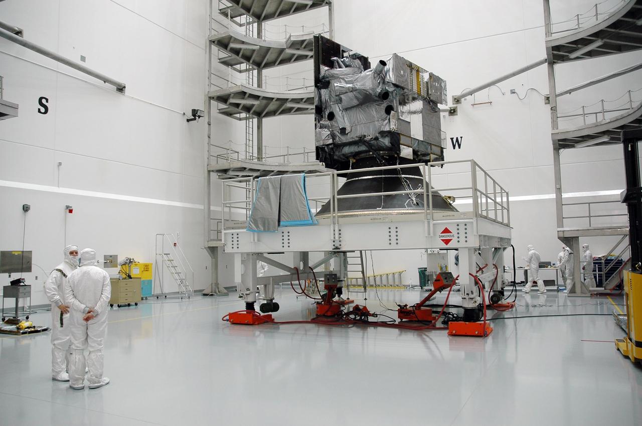 KENNEDY SPACE CENTER, FLA. - At Astrotech Space Operations in Titusville, Fla., the GOES-N satellite is ready for encapsulation in the fairing. The fairing protects the spacecraft during launch and flight through the atmosphere. Once out of the atmosphere, the fairing is jettisoned. GOES-N is the latest in a series of Geostationary Operational Environmental Satellites for NOAA and NASA providing continuous monitoring necessary for intensive data analysis. GOES-N will be launched May 18 on a Boeing Delta IV rocket from Cape Canaveral Air Force Station in Florida. Photo credit: NASA/Jack Pfaller