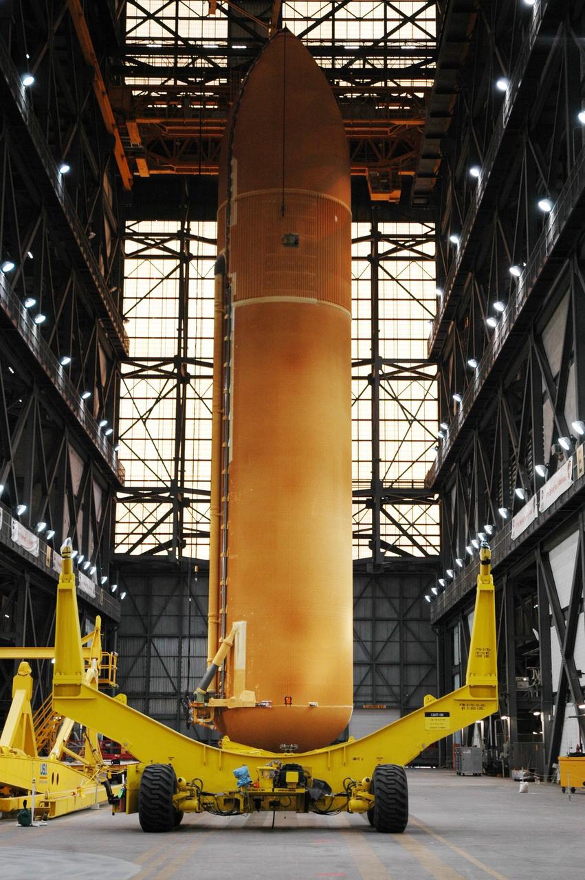 KENNEDY SPACE CENTER, FLA.  -  In the transfer aisle of the Vehicle Assembly Building, the external tank designated for Space Shuttle Discovery is ready to be lifted and moved to high bay 3.  There it will be stacked with the solid rocket boosters already in place on the mobile launcher platform. Discovery is scheduled to launch on mission STS-121 in July.  Photo credit: NASA/Amanda Diller
