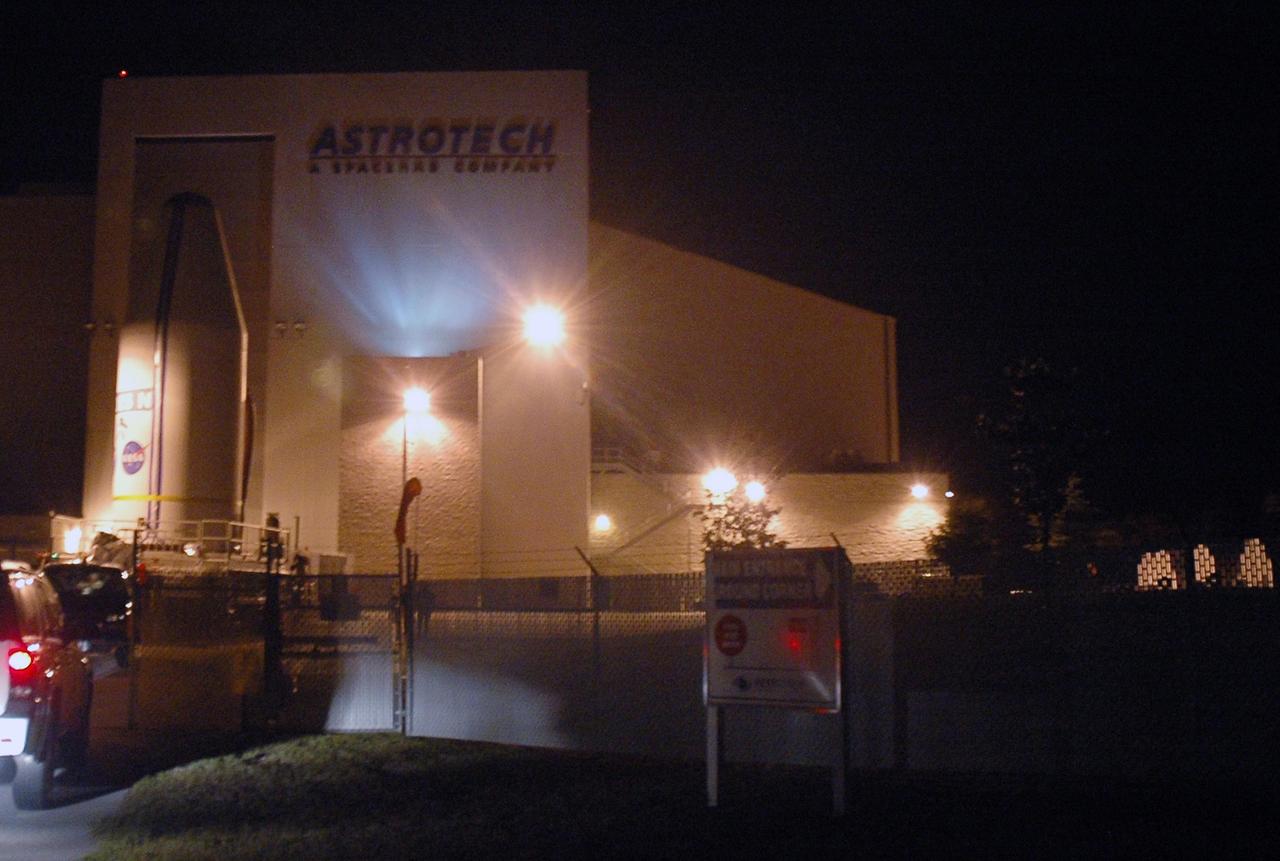 KENNEDY SPACE CENTER, FLA. - On its transporter, the spacecraft GOES-N leaves Astrotech Space Operations in Titusville, Fla., on its way to Launch Complex 37 at Cape Canaveral Air Force Station. At the pad, the spacecraft will be lifted up into the mobile service tower and mated with a Boeing Delta IV rocket for launch. GOES-N is the latest in a series of Geostationary Operational Environmental Satellites for NOAA and NASA providing continuous monitoring necessary for intensive data analysis. GOES-N is scheduled for launch May 18. Photo credit: NASA/Troy Cryder