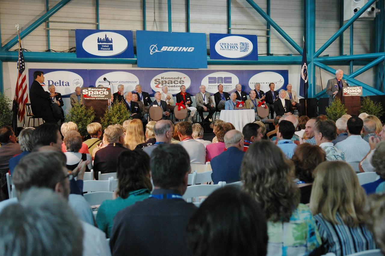 KENNEDY SPACE CENTER, FLA. - The stage in the Apollo/Saturn V Center is lined with former NASA astronauts attending the 2006 induction ceremony for the U.S. Astronaut Hall of Fame. All of them had been previously inducted to the U.S. Astronaut Hall of Fame. They came to welcome the inductees for 2006: Henry "Hank" Hartsfield Jr., Brewster H. Shaw Jr. and Charles F. Bolden Jr. The U.S. Astronaut Hall of Fame now includes 63 space explorers. Photo credit: NASA/Kim Shiflett