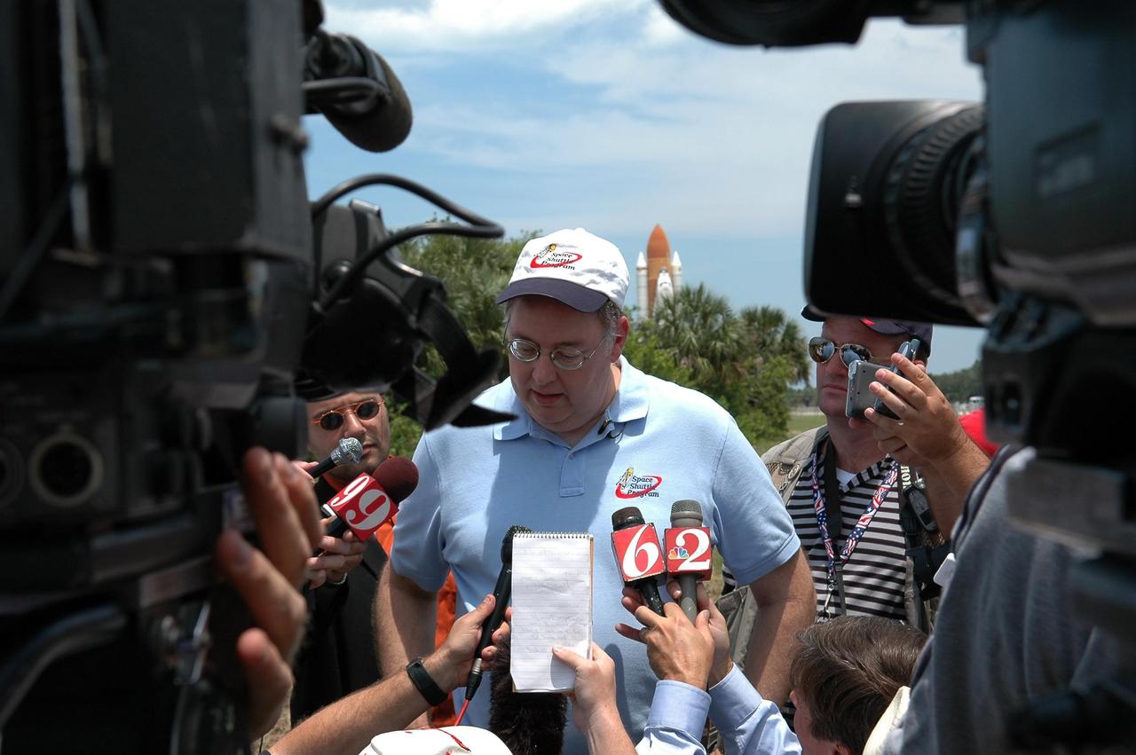 KENNEDY SPACE CENTER, FLA. --  Space Shuttle Program Director Wayne Hale talks to reporters about the rollout of Space Shuttle Discovery to Launch Pad 39B.   First motion from NASA's Vehicle Assembly Building was at 12:45 p.m. EDT.  The rollout is an important step before launch of Discovery on mission STS-121 to the International Space Station. Discovery's launch is targeted for July 1 in a launch window that extends to July 19. During the 12-day mission, Discovery's crew will test new hardware and techniques to improve shuttle safety, as well as deliver supplies and make repairs to the station.  Photo credit: NASA/Kim Shiflett