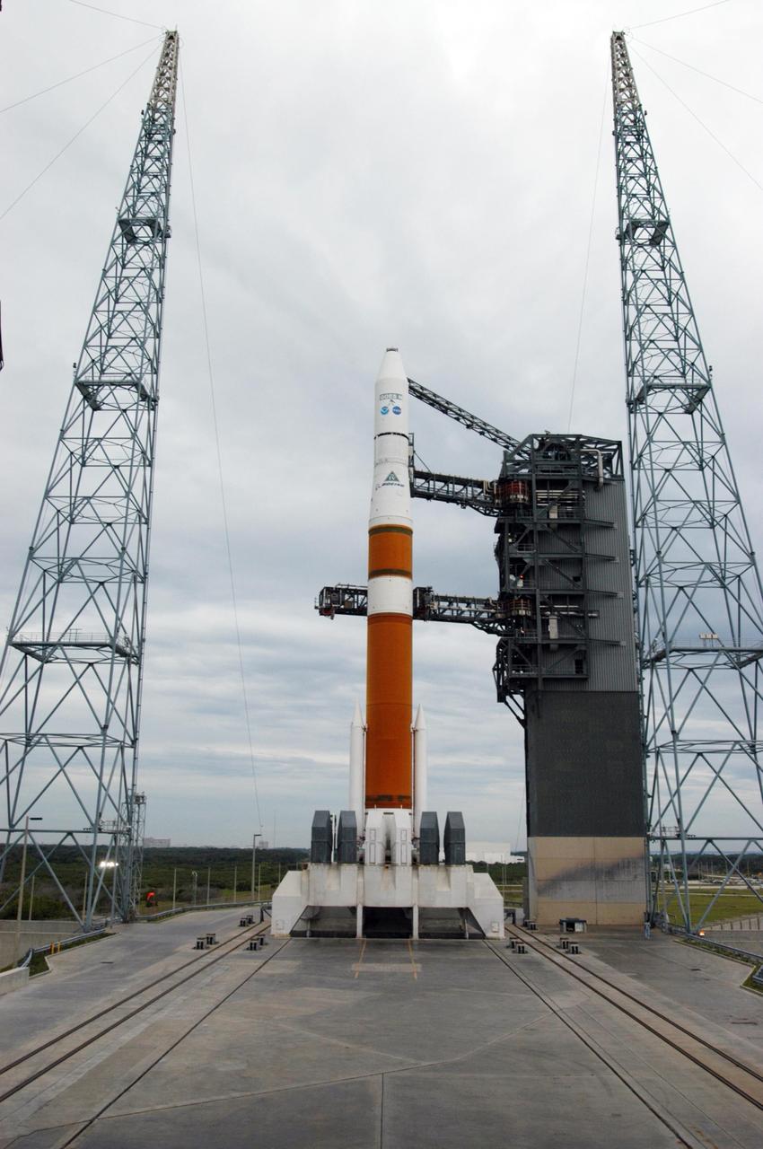 KENNEDY SPACE CENTER, FLA. - The mobile service tower on Launch Complex 37 at Cape Canaveral Air Force Station has been removed from around a Boeing Delta IV rocket as preparations continue to launch the GOES-N satellite. GOES-N is the latest in a series of Geostationary Operational Environmental Satellites for NOAA and NASA. A geostationary orbit is one in which a satellite remains in the same position with respect to the rotating Earth. Thus, the satellite hovers continuously over one position on the Earth's surface, appearing stationary. As a result, GOES provide a constant vigil for the atmospheric "triggers" for severe weather conditions such as tornadoes, flash floods, hail storms, and hurricanes. GOES-N is scheduled for launch May 24 in an hour-long window between 6:11 and 7:11 p.m. EDT. Photo credit: NASA/George Shelton