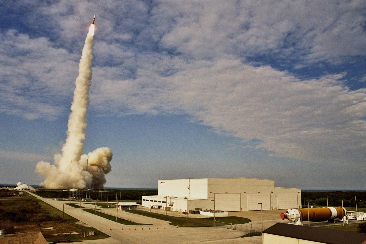 KENNEDY SPACE CENTER, FLA. - A Boeing Delta IV rocket roars off the launch pad to lift the GOES-N satellite on top into space. Liftoff from Launch Complex 37 at Cape Canaveral Air Force Station was on time at 6:11 p.m. EDT. GOES-N is the latest in the Earth-monitoring series of Geostationary Operational Environmental Satellites developed by NASA and the National Oceanic and Atmospheric Administration. By maintaining a stationary orbit, hovering over one position on the Earth's surface, GOES will be able to provide a constant vigil for the atmospheric "triggers" for severe weather conditions such as tornadoes, flash floods, hail storms and hurricanes. Photo by Carleton Bailie for Boeing