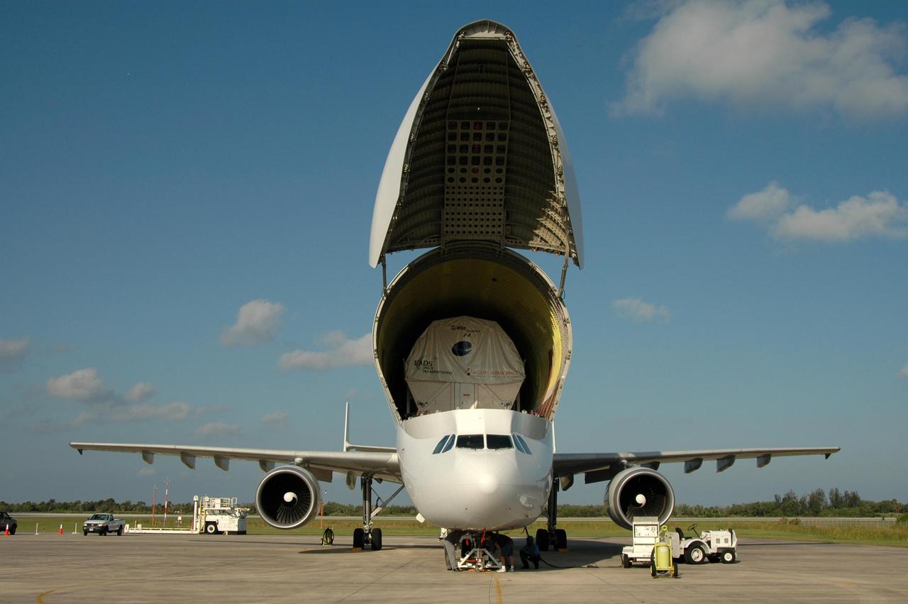 KENNEDY SPACE CENTER, FLA. -   At the Shuttle Landing Facility, the European Space Agency's research laboratory, designated Columbus, slides out onto an Airbus Transport International platform that will lower it to the ground.  The module will then be lifted onto a flat bed truck and transported to the Space Station Processing Facility.  There the module will be prepared for delivery to the International Space Station on a future space shuttle mission.  Columbus will expand the research facilities of the station and provide researchers with the ability to conduct numerous experiments in the area of life, physical and materials sciences.  Photo credit: NASA/Jim Grossmann