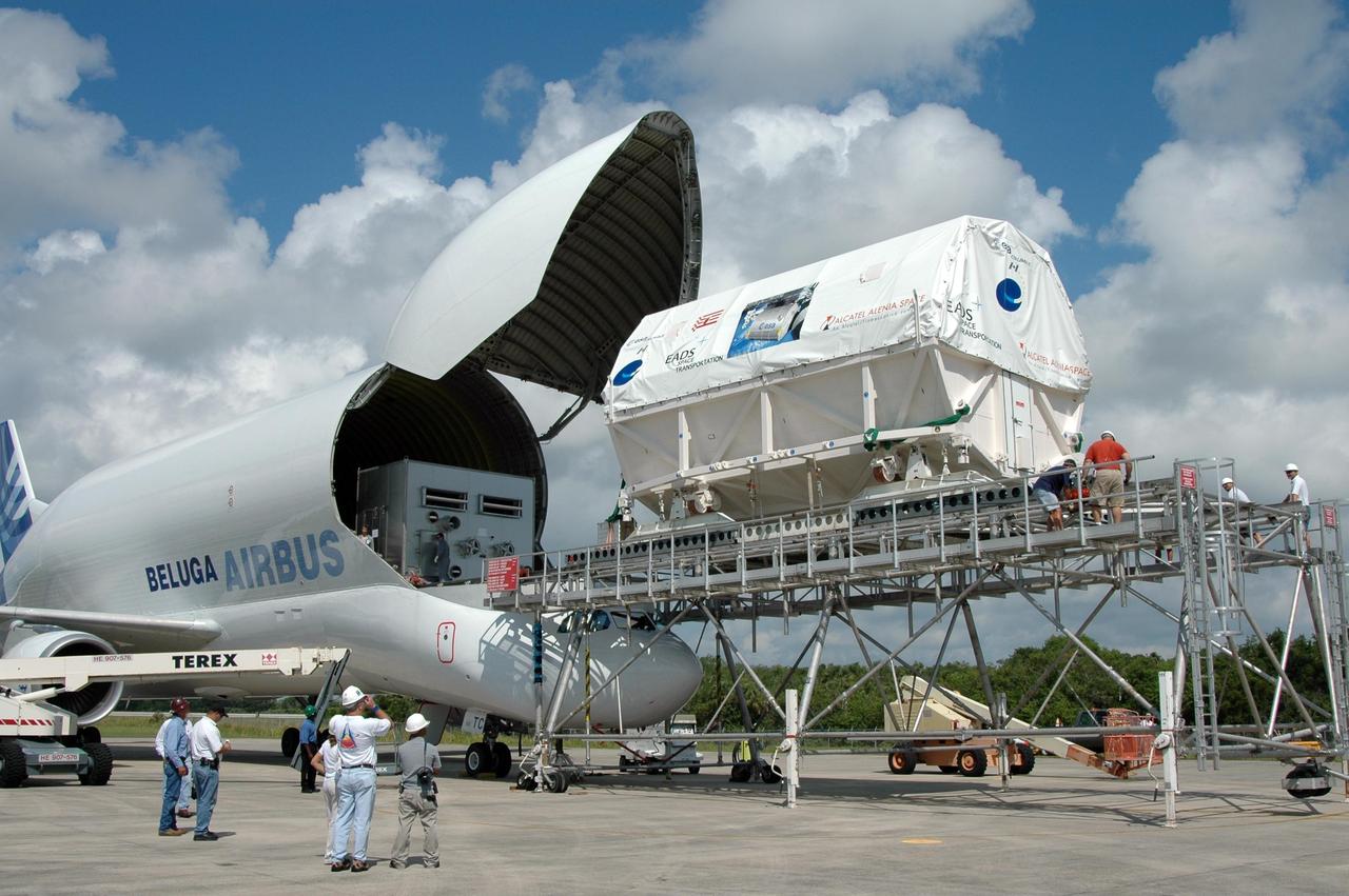 KENNEDY SPACE CENTER, FLA. -   At the Shuttle Landing Facility, the European Space Agency's research laboratory, designated Columbus, has been offloaded onto an Airbus Transport International platform.  The module will be lifted off the platform onto a flat bed truck and transported to the Space Station Processing Facility at NASA's Kennedy Space Center.  The module arrived on a Beluga Airbus May 30 at NASA's Kennedy Space Center from the manufacturer in Germany.  In the SSPF, the module will be prepared for delivery to the International Space Station on a future space shuttle mission.  Columbus will expand the research facilities of the station and provide researchers with the ability to conduct numerous experiments in the area of life, physical and materials sciences.  Photo credit: NASA/Jim Grossmann