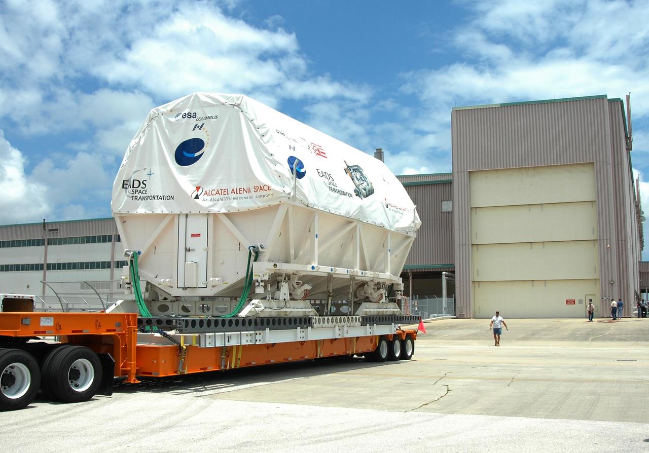 KENNEDY SPACE CENTER, FLA. -   The truck transporting Columbus, the European Space Agency's research laboratory, arrives at the Space Station Processing Facility at NASA's Kennedy Space Center.  The module arrived on a Beluga Airbus May 30 at NASA's Kennedy Space Center from the manufacturer in Germany.  In the SSPF, the module will be prepared for delivery to the International Space Station on a future space shuttle mission.  Columbus will expand the research facilities of the station and provide researchers with the ability to conduct numerous experiments in the area of life, physical and materials sciences.  Photo credit: NASA/Jim Grossmann