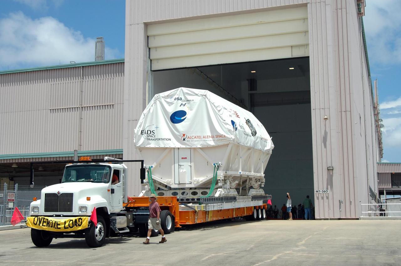 KENNEDY SPACE CENTER, FLA. -   The truck transporting Columbus, the European Space Agency's research laboratory, moves the module inside the Space Station Processing Facility at NASA's Kennedy Space Center.  The module arrived on a Beluga Airbus May 30 at NASA's Kennedy Space Center from the manufacturer in Germany.  In the SSPF, the module will be prepared for delivery to the International Space Station on a future space shuttle mission.  Columbus will expand the research facilities of the station and provide researchers with the ability to conduct numerous experiments in the area of life, physical and materials sciences.  Photo credit: NASA/Jim Grossmann