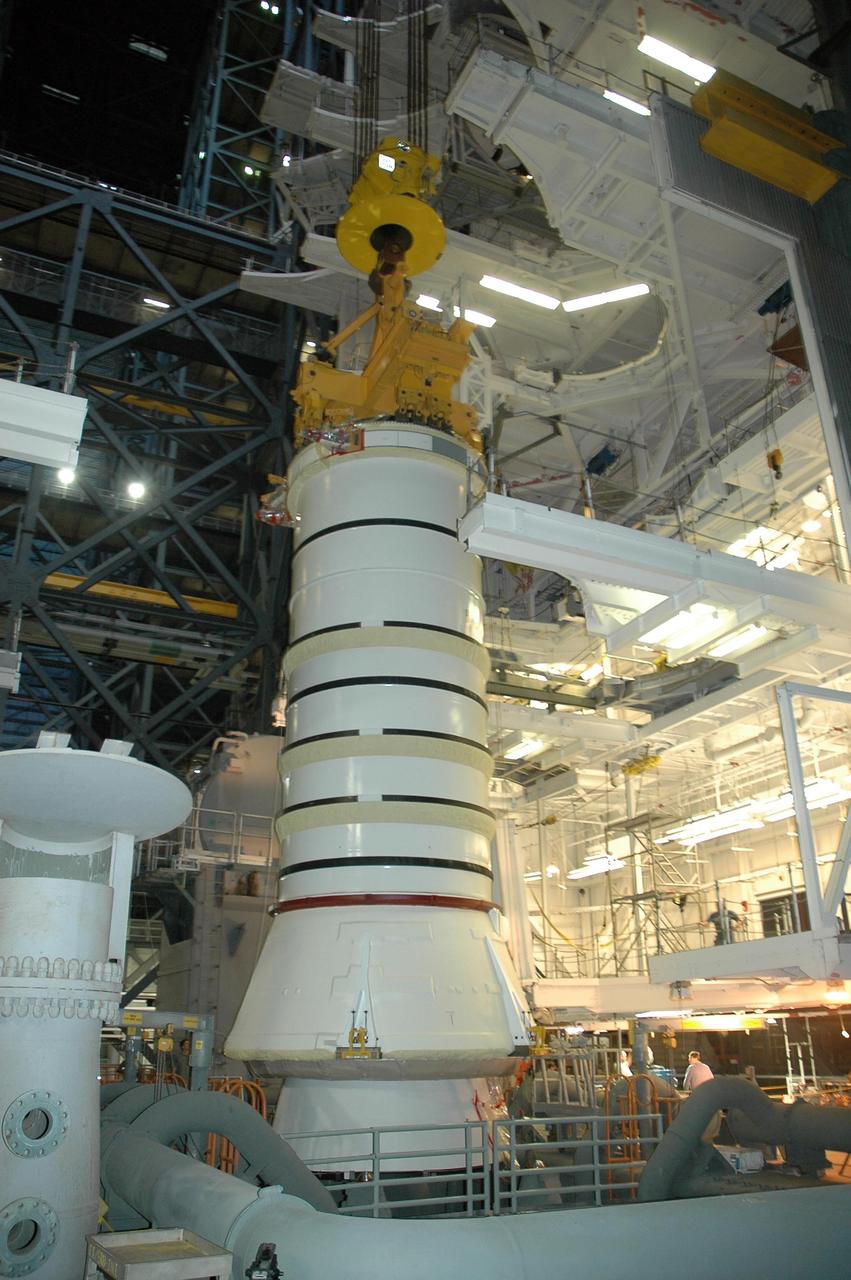 KENNEDY SPACE CENTER, FLA. -  In high bay 3 of the Vehicle Assembly Building at NASA's Kennedy Space Center, a solid rocket booster segment is placed on mobile launcher platform No. 2 for use on mission STS-115.  The mission will deliver a truss and other key components to the International Space Station.  Launch is currently scheduled for late August.  Photo credit: NASA/Charisse Nahser