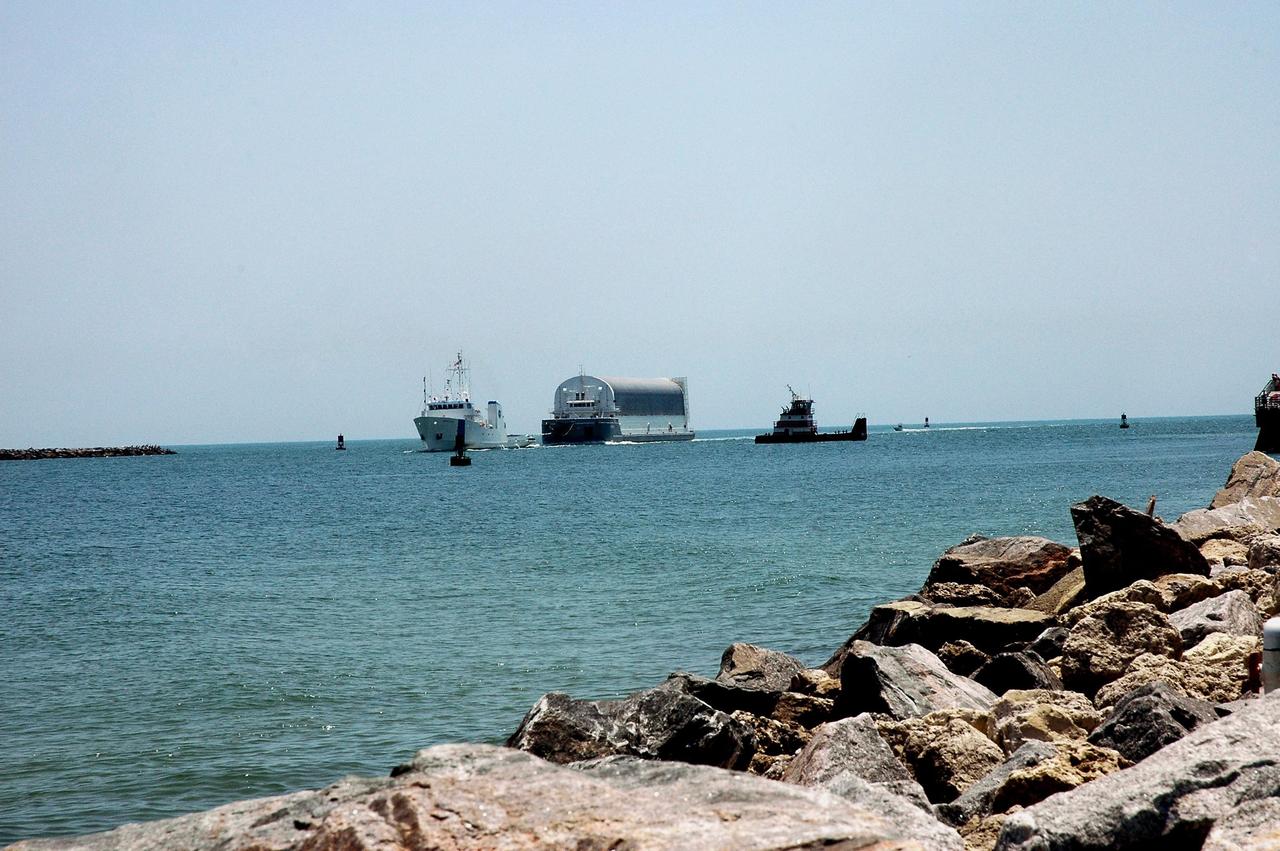 KENNEDY SPACE CENTER, FLA. -   The Liberty Star (left) tows the Pegasus barge through Port Canaveral, the last leg of its journey from the Michoud Assembly Facility in New Orleans to Kennedy Space Center. The barge carries the redesigned external fuel tank that will launch Space Shuttle Atlantis on the next shuttle mission, STS-115. A tugboat will continue the journey upriver to the Turn Basin where, after off-loading, the tank will be moved into the Vehicle Assembly Building and lifted into a checkout cell for further work. The tank, designated ET-118, will fly with many major safety changes, including the removal of the protuberance air load ramps.  Photo credit: NASA/Jack Pfaller