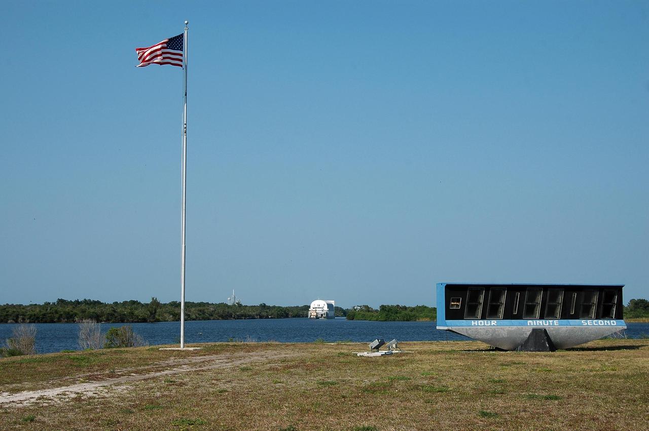 KENNEDY SPACE CENTER, FLA. -   Viewed from the NASA News Center, a tug boat in the background maneuvers the Pegasus barge into the turn basin at the Launch Complex 39 Area.  The barge holds  the redesigned external fuel tank, designated ET-118, that will launch Space Shuttle Atlantis on the next shuttle mission, STS-115. The tank was shipped from the Michoud Assembly Facility in New Orleans.  After off-loading, the tank will be moved into the Vehicle Assembly Building and lifted into a checkout cell for further work. The tank will fly with many major safety changes, including the removal of the protuberance air load ramps. Photo credit: NASA/Kim Shiflett