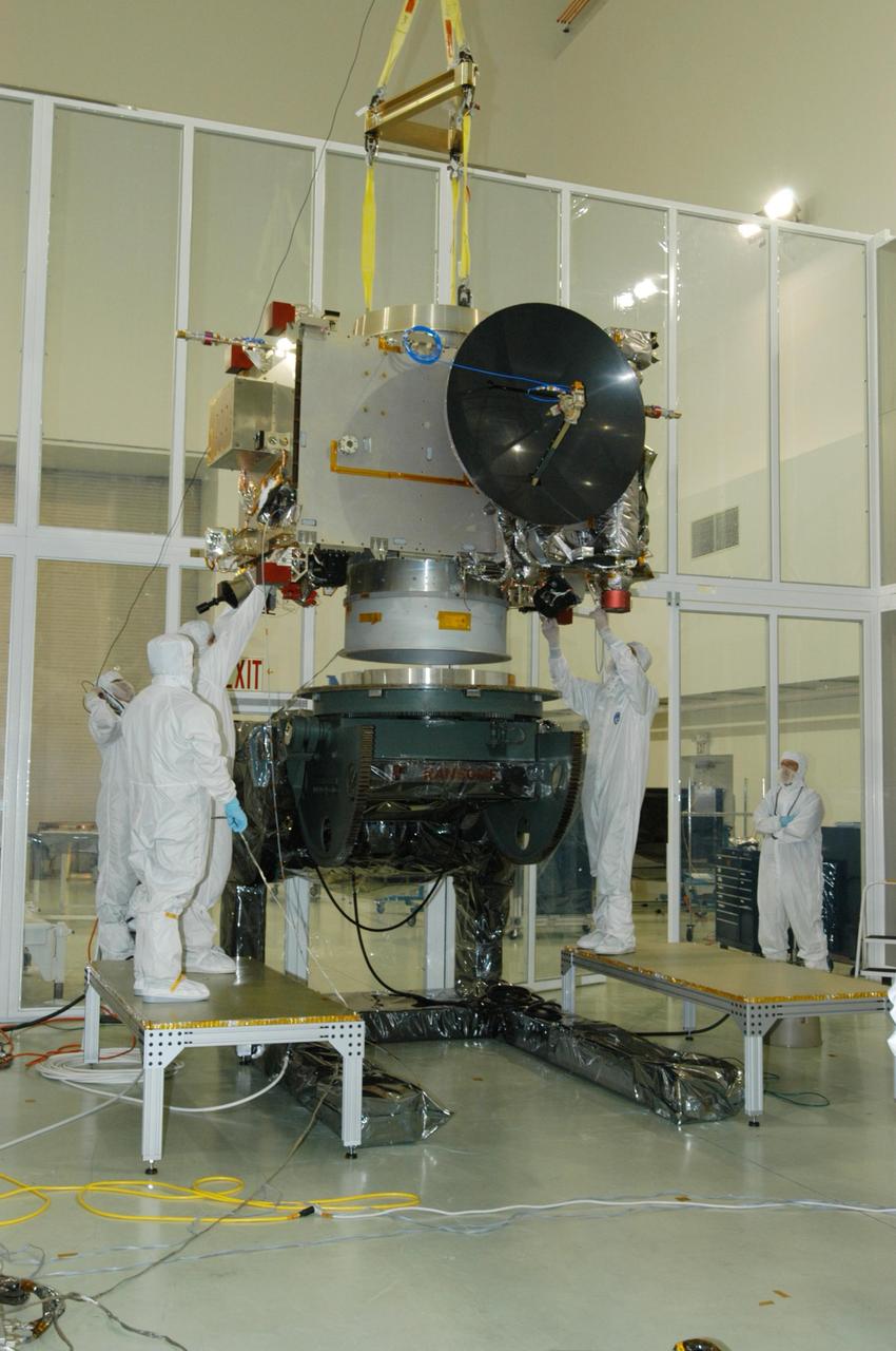KENNEDY SPACE CENTER, FLA. - At Astrotech Space Operations in Titusville, Fla., technicians check the STEREO spacecraft "B" as it is lifted off a tilt table. STEREO stands for Solar Terrestrial Relations Observatory. The STEREO mission is the first to take measurements of the sun and solar wind in 3-dimension. This new view will improve our understanding of space weather and its impact on the Earth. STEREO is expected to lift off aboard a Boeing Delta II rocket on July 22. Photo credit: NASA/George Shelton