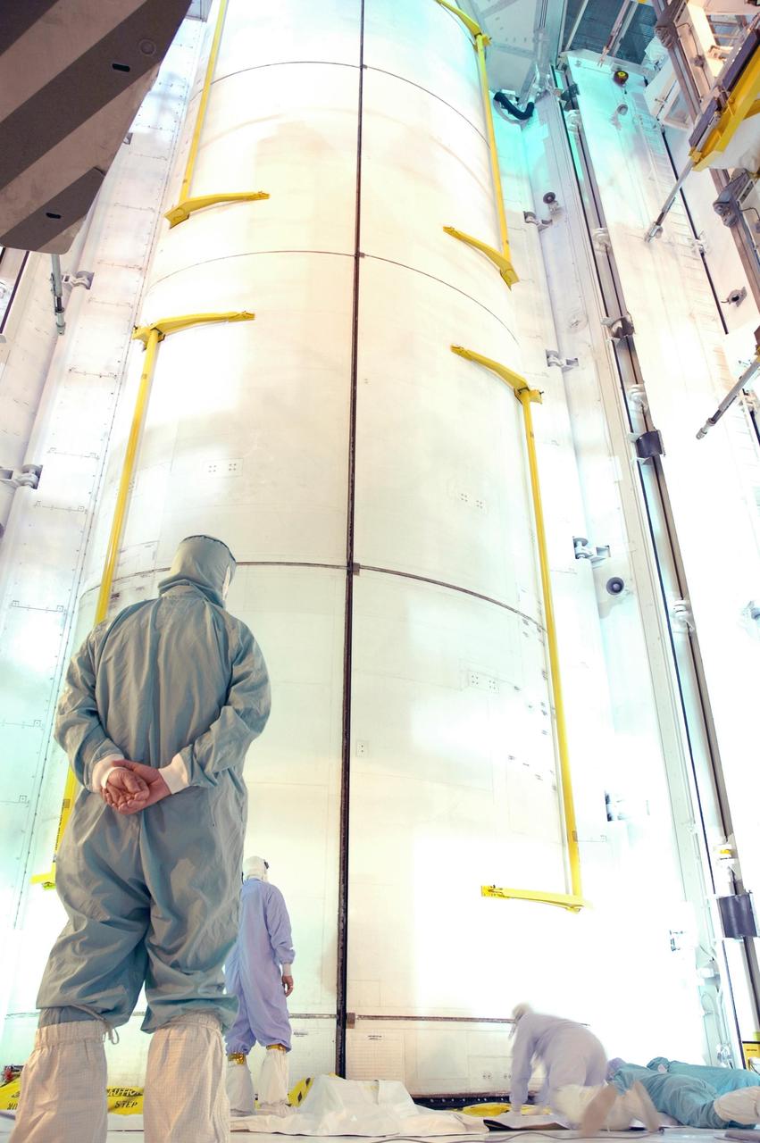 KENNEDY SPACE CENTER, FLA. - At Launch Pad 39B, both of Space Shuttle Discovery's payload bay doors are closing for launch. Inside the payload bay, the cargo includes the multi-purpose logistics module Leonardo and the integrated cargo carrier. Discovery is scheduled to launch on mission STS-121 at 3:49 p.m. July 1 carrying a crew of seven on the 12-day mission to the International Space Station. Photo credit: NASA/Jim Grossmann