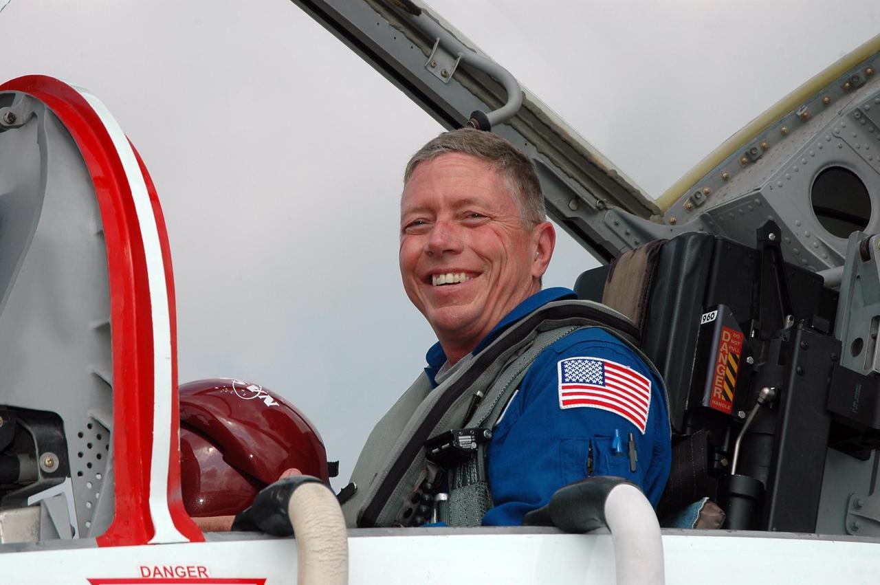 KENNEDY SPACE CENTER, FLA. -    STS-121 Mission Specialist Michael Fossum arrives at KSC aboard a T-38 jet aircraft to get ready for launch on July 1. The launch will be his first space flight.   During the 12-day mission, the STS-121 crew will test new equipment and procedures to improve shuttle safety, as well as deliver supplies and make repairs to the International Space Station. This mission is the 115th shuttle flight and the 18th U.S. flight to the International Space Station.  Photo credit: NASA/Kim Shiflett
