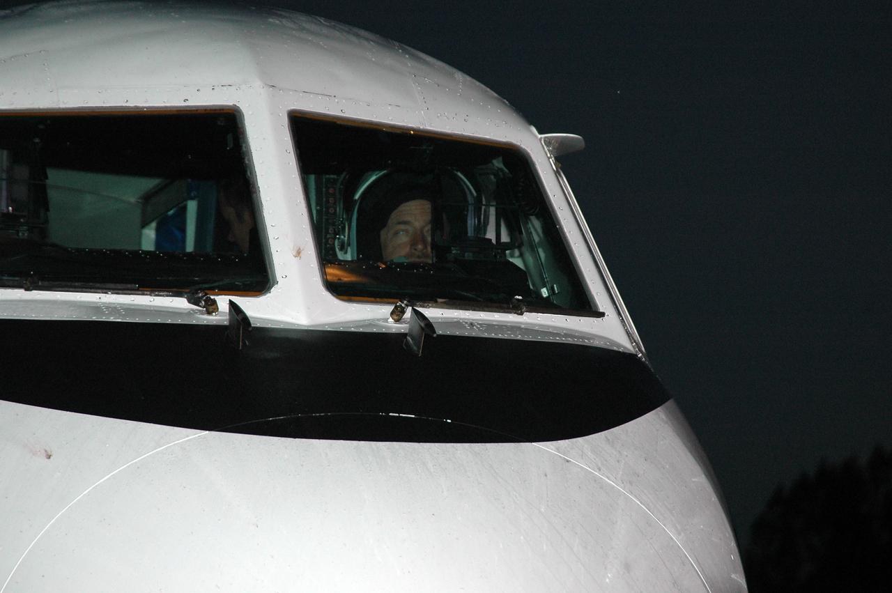 KENNEDY SPACE CENTER, FLA. -  In the cockpit of the Shuttle Training Aircraft (STA), STS-121 Pilot Mark Kelly is ready for takeoff from the Shuttle Landing Facility.  Kelly and Commander Steven Lindsey will be making practice landings in preparation for the July 1 launch of Space Shuttle Discovery.  The STA is a Grumman American Aviation-built Gulf Stream II jet that was modified to simulate an orbiter’s cockpit, motion and visual cues, and handling qualities. In flight, the STA duplicates the orbiter’s atmospheric descent trajectory from approximately 35,000 feet altitude to landing on a runway. Because the orbiter is unpowered during re-entry and landing, its high-speed glide must be perfectly executed the first time.  Photo credit: NASA/Kim Shiflett