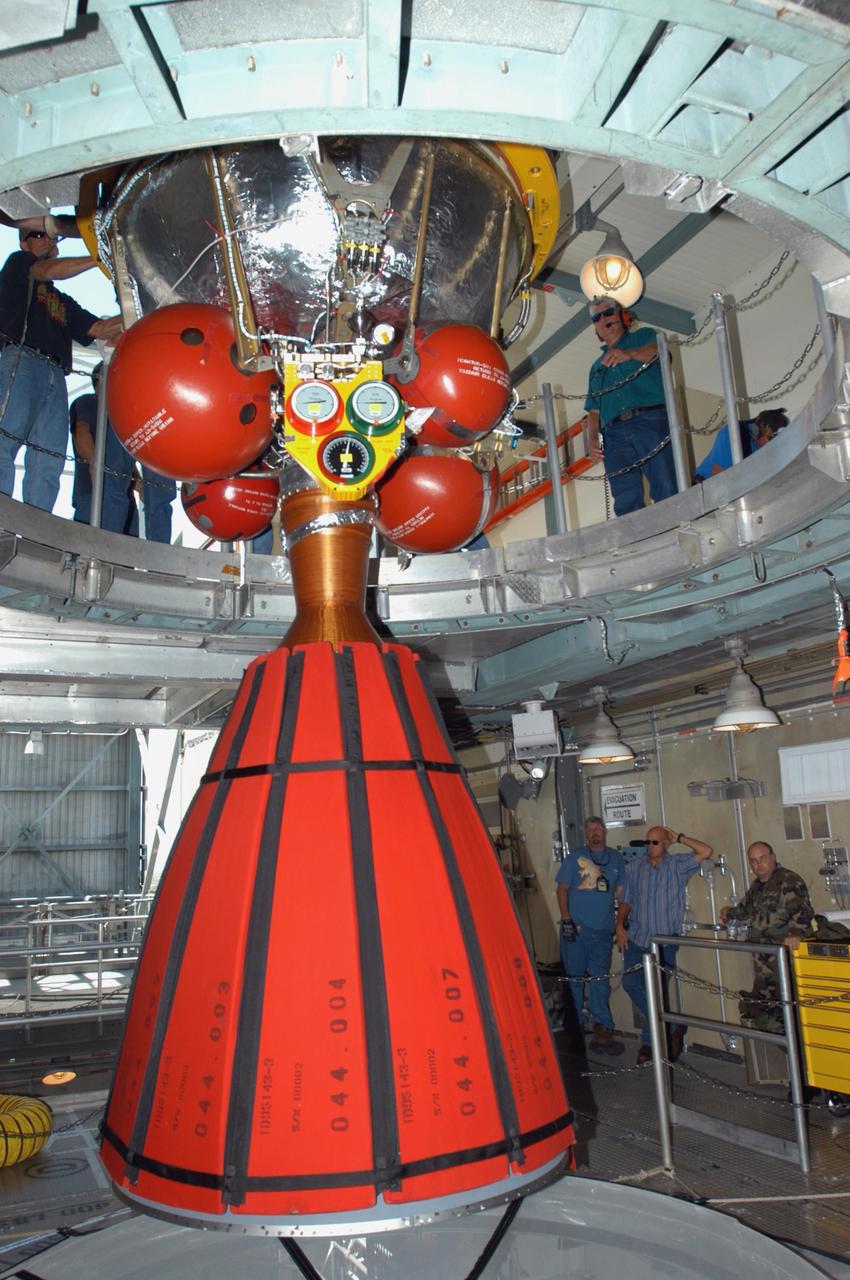 KENNEDY SPACE CENTER, FLA. - Inside the mobile service tower on Launch Pad 17-B on Cape Canaveral Air Force Station, the Boeing Delta II second stage for the STEREO launch is lowered toward the first stage. The two stages will be mated. STEREO stands for Solar Terrestrial Relations Observatory and comprises two spacecraft. The STEREO mission is the first to take measurements of the sun and solar wind in 3-dimension. This new view will improve our understanding of space weather and its impact on the Earth. STEREO is expected to lift off in August 2006. Photo credit: NASA/George Shelton