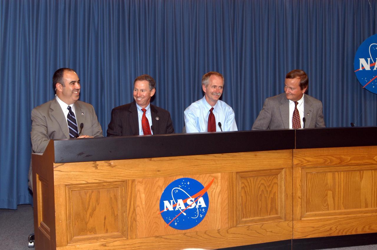 KENNEDY SPACE CENTER, FLA. -  A press conference after the landing of the orbiter Discovery and mission STS-121 crew features NASA and Kennedy Space Center senior management.  From left, NASA Public Affairs Dean Acosta moderated questions posed to NASA Administrator Mike Griffin, Associate Administrator for Space Operations Bill Gerstenmaier and Shuttle Launch Director Mike Leinbach. Discovery traveled  5.3 million miles, landing on orbit 202.  Mission elapsed time was 12 days, 18 hours, 37 minutes and 54 seconds. The landing is the 62nd at Kennedy Space Center and the 32nd for Discovery.  Photo credit: NASA/George Shelton