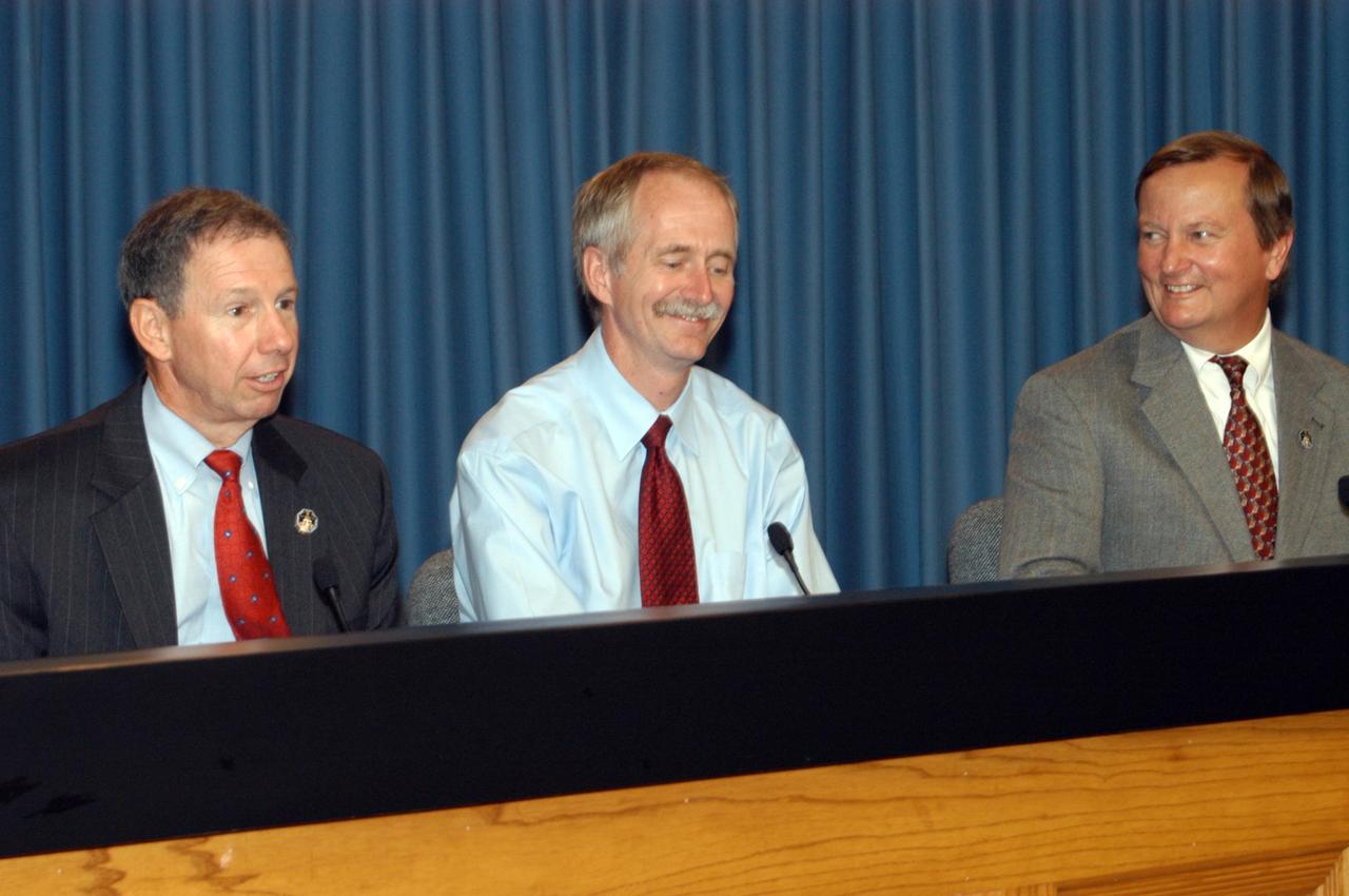 KENNEDY SPACE CENTER, FLA. -  A press conference after the landing of the orbiter Discovery and mission STS-121 crew features NASA Administrator Mike Griffin, Associate Administrator for Space Operations Bill Gerstenmaier and Shuttle Launch Director Mike Leinbach.  A few of the questions from the media evoked smiles from the panelists. Discovery traveled  5.3 million miles, landing on orbit 202.  Mission elapsed time was 12 days, 18 hours, 37 minutes and 54 seconds. The landing is the 62nd at Kennedy Space Center and the 32nd for Discovery.  Photo credit: NASA/George Shelton
