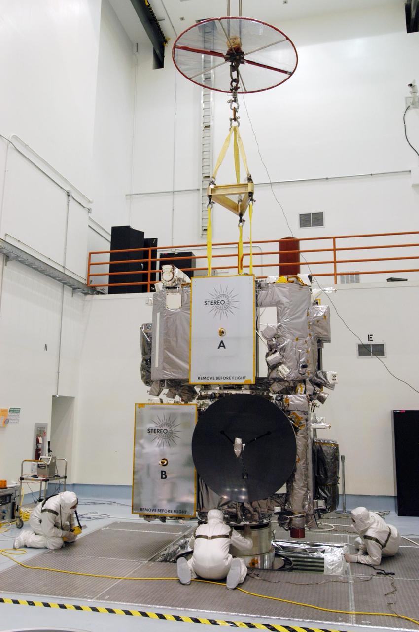 KENNEDY SPACE CENTER, FLA. -  Technicians inside the Astrotech facility in Titusville, Florida, move the STEREO spacecraft to the spin table. The twin observatories will undergo a spin test to check balance and alignment in preparation for flight. STEREO stands for Solar Terrestrial Relations Observatory. The STEREO mission is the first to take measurements of the sun and solar wind in 3-dimension. This new view will improve our understanding of space weather and its impact on the Earth. STEREO is expected to lift off on Aug. 31, from Launch Pad 17-B on Cape Canaveral Air Force Station in Florida. Photo credit: NASA/George Shelton.