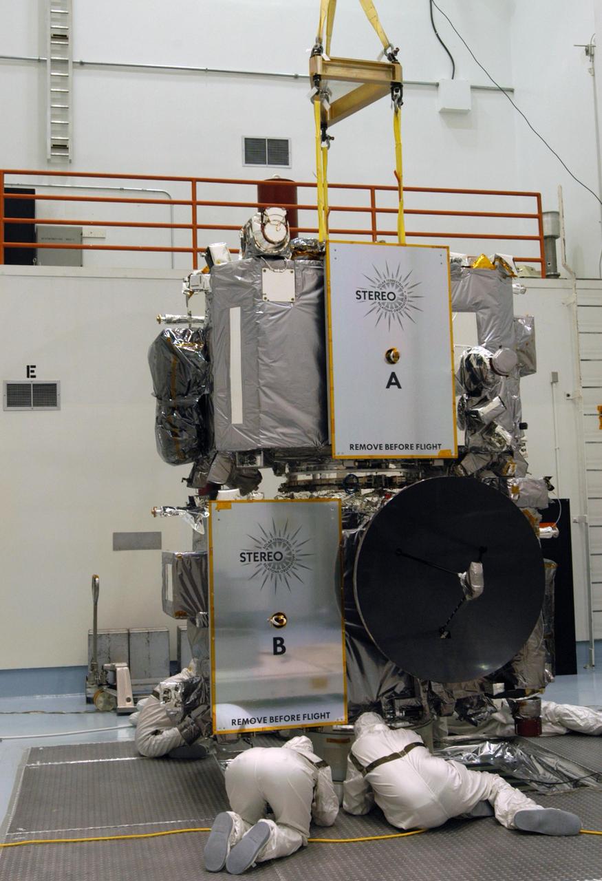 KENNEDY SPACE CENTER, FLA. -  Technicians inside the Astrotech facility in Titusville, Florida, move the STEREO spacecraft to the spin table. The twin observatories will undergo a spin test to check balance and alignment in preparation for flight. STEREO stands for Solar Terrestrial Relations Observatory. The STEREO mission is the first to take measurements of the sun and solar wind in 3-dimension. This new view will improve our understanding of space weather and its impact on the Earth. STEREO is expected to lift off on Aug. 31, from Launch Pad 17-B on Cape Canaveral Air Force Station in Florida. Photo credit: NASA/George Shelton.