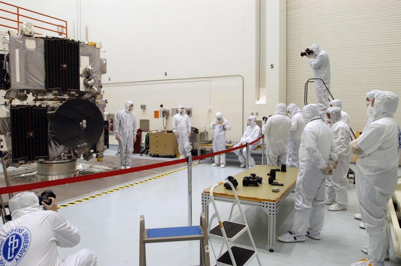 KENNEDY SPACE CENTER, FLA. -  The STEREO observatories are the focus of attention at a media viewing held at Astrotech Space Operations in Titusville, Fla., on Aug. 11.  The two observatories were mated for launch but will separate into different orbits for their mission. STEREO stands for Solar Terrestrial Relations Observatory. The STEREO mission is the first to take measurements of the sun and solar wind in 3-dimension. This new view will improve our understanding of space weather and its impact on the Earth. STEREO is expected to lift off on Aug. 31, from Launch Pad 17-B on Cape Canaveral Air Force Station in Florida. Photo credit: NASA/George Shelton.