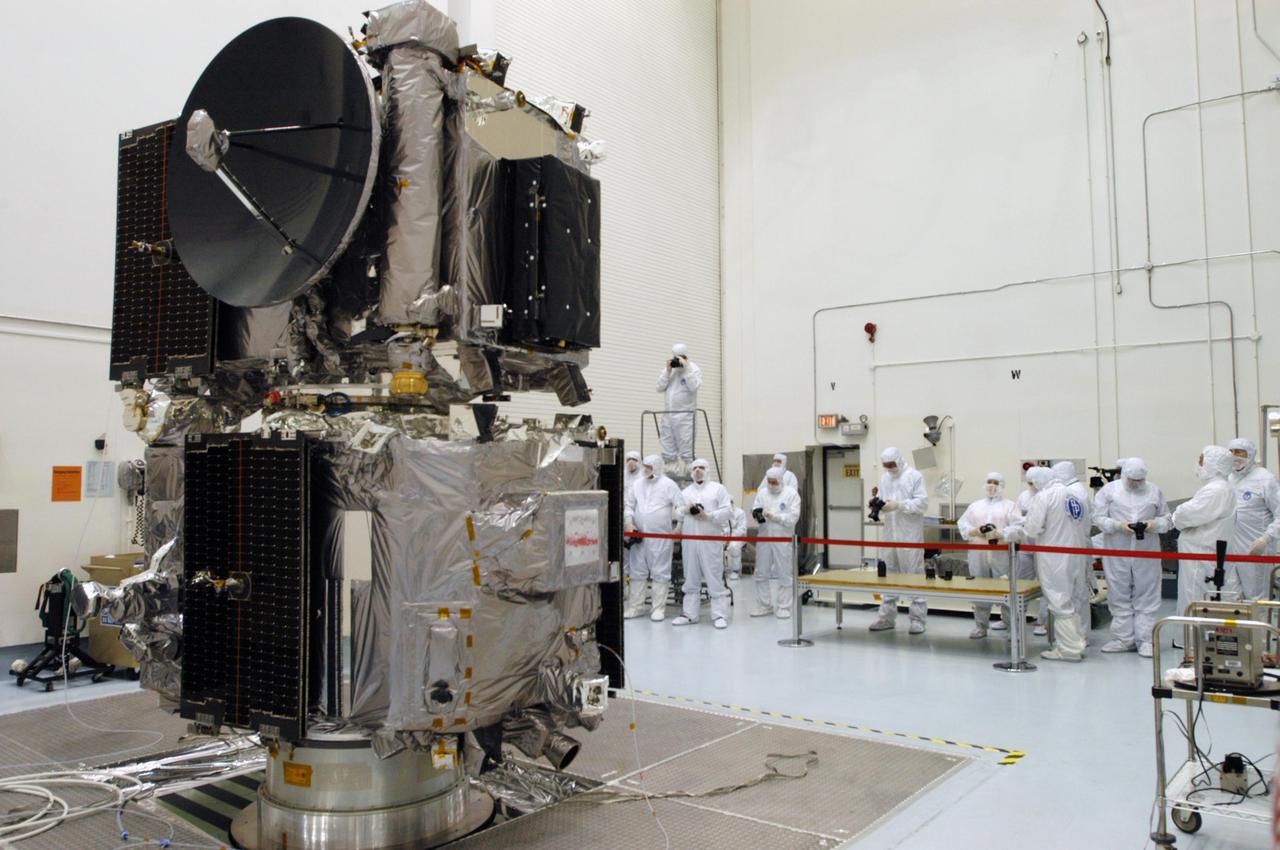 KENNEDY SPACE CENTER, FLA. -  The STEREO observatories are the focus of attention at a media viewing held at Astrotech Space Operations in Titusville, Fla., on Aug. 11.  The two observatories were mated for launch but will separate into different orbits for their mission. STEREO stands for Solar Terrestrial Relations Observatory. The STEREO mission is the first to take measurements of the sun and solar wind in 3-dimension. This new view will improve our understanding of space weather and its impact on the Earth. STEREO is expected to lift off on Aug. 31, from Launch Pad 17-B on Cape Canaveral Air Force Station in Florida. Photo credit: NASA/George Shelton.