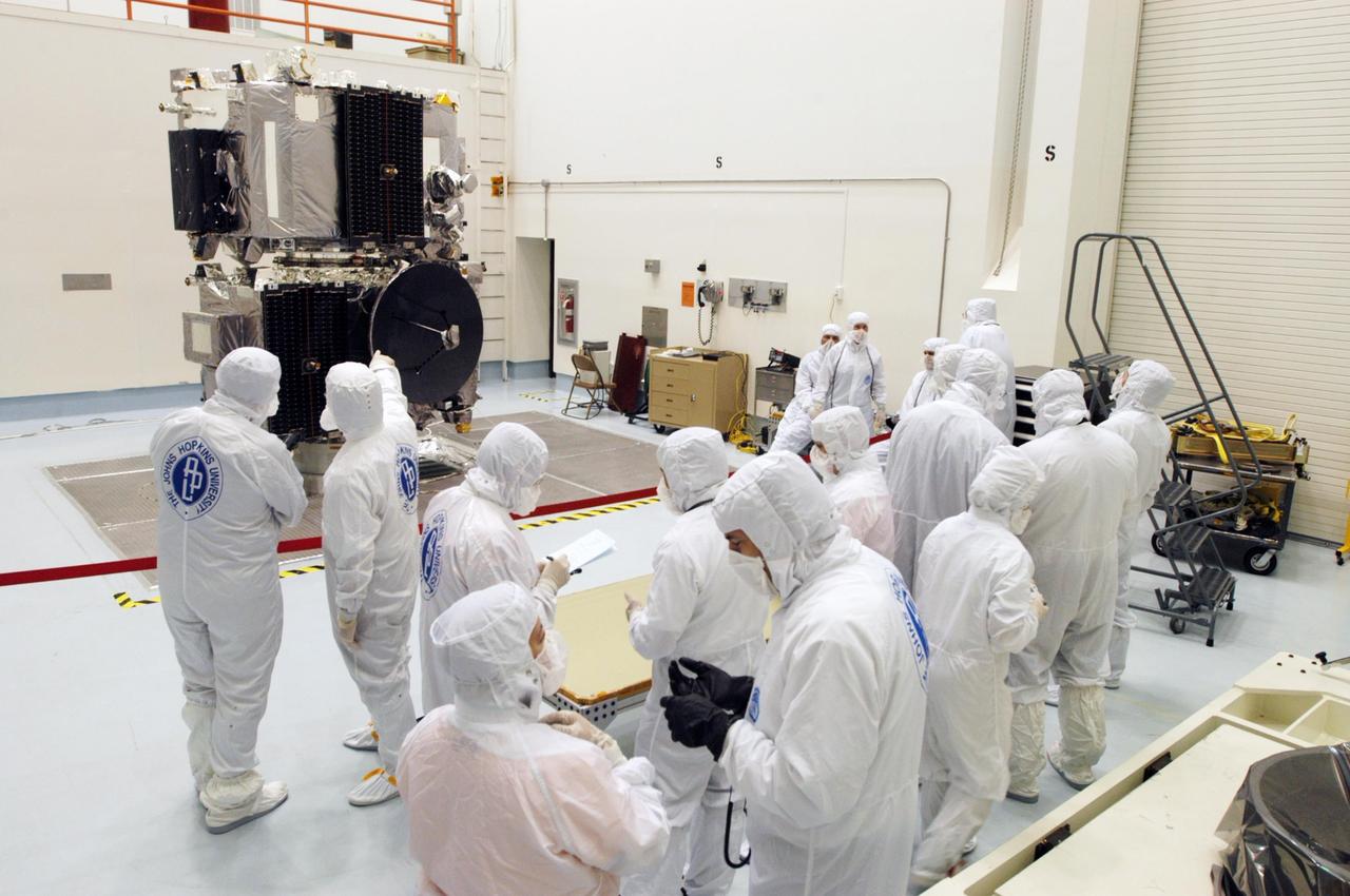 KENNEDY SPACE CENTER, FLA. -  The STEREO observatories are the focus of attention at a media viewing held at Astrotech Space Operations in Titusville, Fla., on Aug. 11.  The two observatories were mated for launch but will separate into different orbits for their mission. STEREO stands for Solar Terrestrial Relations Observatory. The STEREO mission is the first to take measurements of the sun and solar wind in 3-dimension. This new view will improve our understanding of space weather and its impact on the Earth. STEREO is expected to lift off on Aug. 31, from Launch Pad 17-B on Cape Canaveral Air Force Station in Florida. Photo credit: NASA/George Shelton.