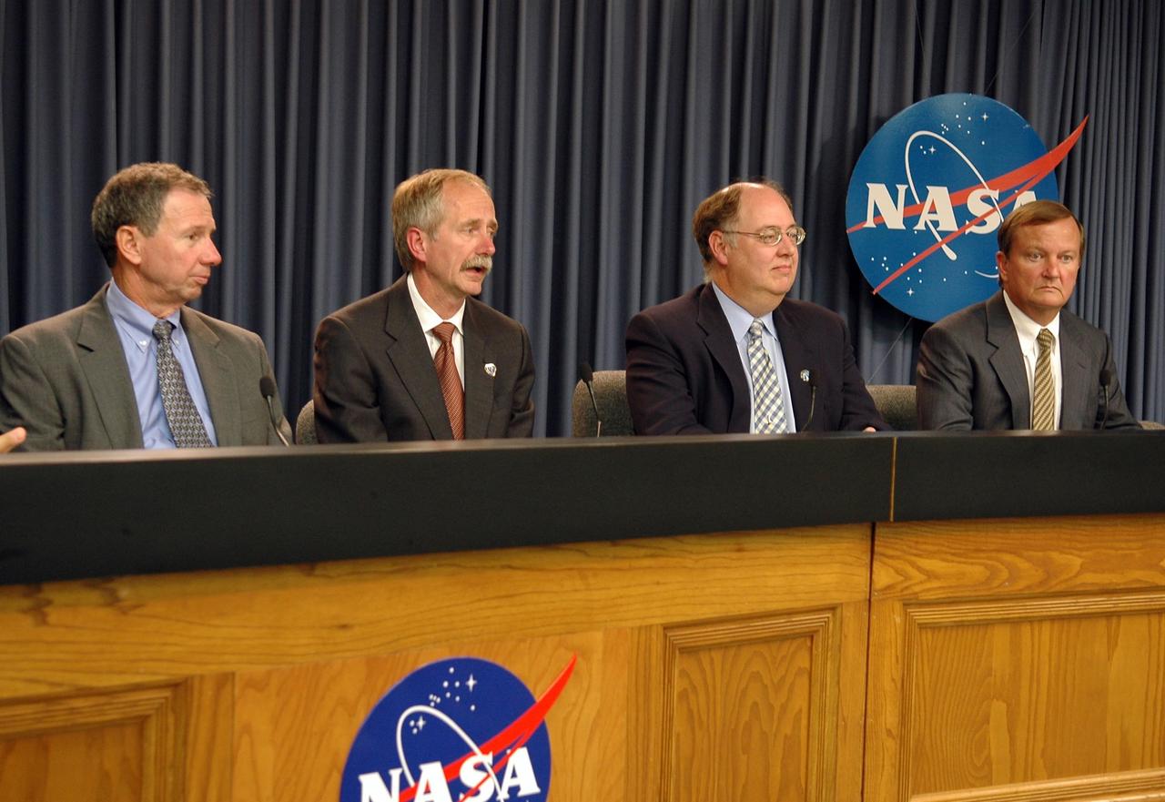 KENNEDY SPACE CENTER, FLA. - At a press conference following the Flight Readiness Review, a thorough assessment of preparations for the mission, NASA officials announce the final launch date of Aug. 27 for mission STS-115. Seated left to right are Michael Griffin, NASA administrator; Bill Gerstenmaier, associate administrator for Space Operations; Wayne Hale, Space Shuttle Program manager; and Mike Leinbach, NASA launch director. They also answered questions from the media. Mission STS-115 continues the assembly of the International Space Station with the installation of the truss segments P3 and P4. Liftoff of Space Shuttle Atlantis on mission STS-115 is targeted at approximately 4:30 p.m. EDT on Aug. 27. Photo credit: NASA/Kim Shiflett