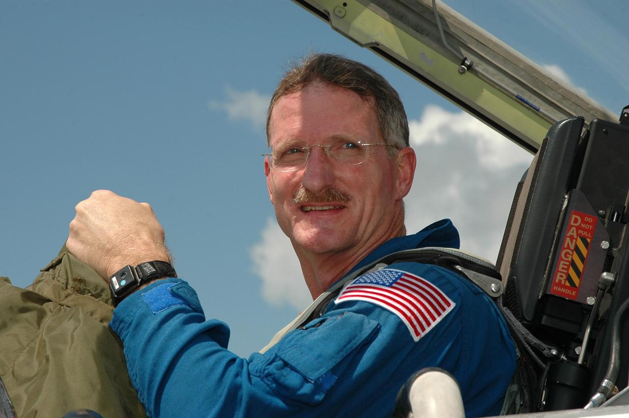 KENNEDY SPACE CENTER, FLA. -  The crew of mission STS-115 arrives at NASA Kennedy Space Center's Shuttle Landing Facility to prepare for launch on Aug. 27 to the International Space Station.  Seen here is Mission Specialist Joseph Tanner,  who will be making his fourth flight on the shuttle.  The mission will deliver and install the 17-and-a-half-ton P3/P4 truss segment to the port side of the integrated truss system on the orbital outpost.  The truss includes a new set of photovoltaic solar arrays.  When unfurled to their full length of 240 feet, the arrays will provide additional power for the station in preparation for the delivery of international science modules over the next two years.  STS-115 is expected to last 11 days and includes three scheduled spacewalks.    Photo credit: NASA/Kim Shiflett