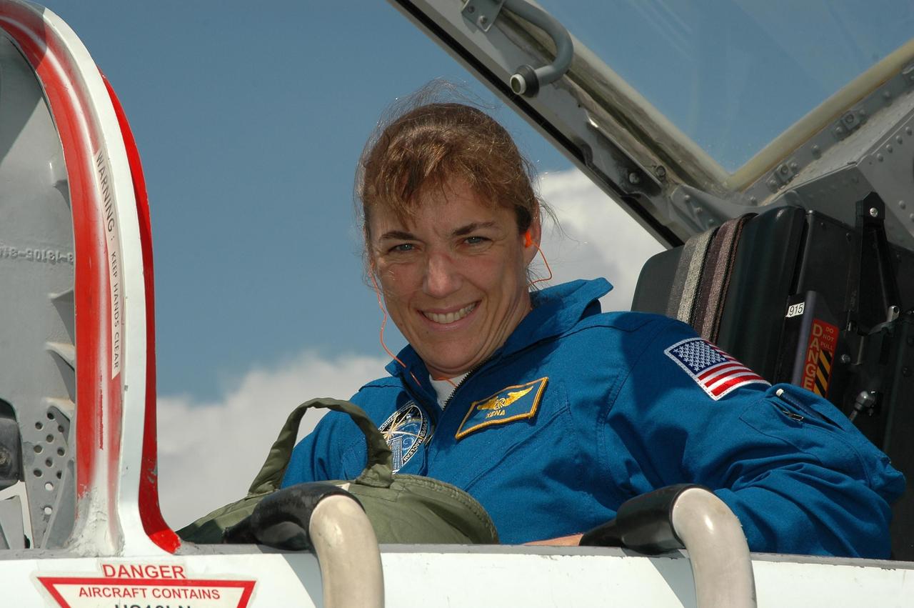 KENNEDY SPACE CENTER, FLA. -   The crew of mission STS-115 arrives at NASA Kennedy Space Center's Shuttle Landing Facility to prepare for launch on Aug. 27 to the International Space Station.  Seen here is Mission Specialist Heidemarie Stefanyshyn-Piper, who will be making her first flight on the shuttle.  The mission will deliver and install the 17-and-a-half-ton P3/P4 truss segment to the port side of the integrated truss system on the orbital outpost.  The truss includes a new set of photovoltaic solar arrays.  When unfurled to their full length of 240 feet, the arrays will provide additional power for the station in preparation for the delivery of international science modules over the next two years.  STS-115 is expected to last 11 days and includes three scheduled spacewalks.    Photo credit: NASA/Kim Shiflett