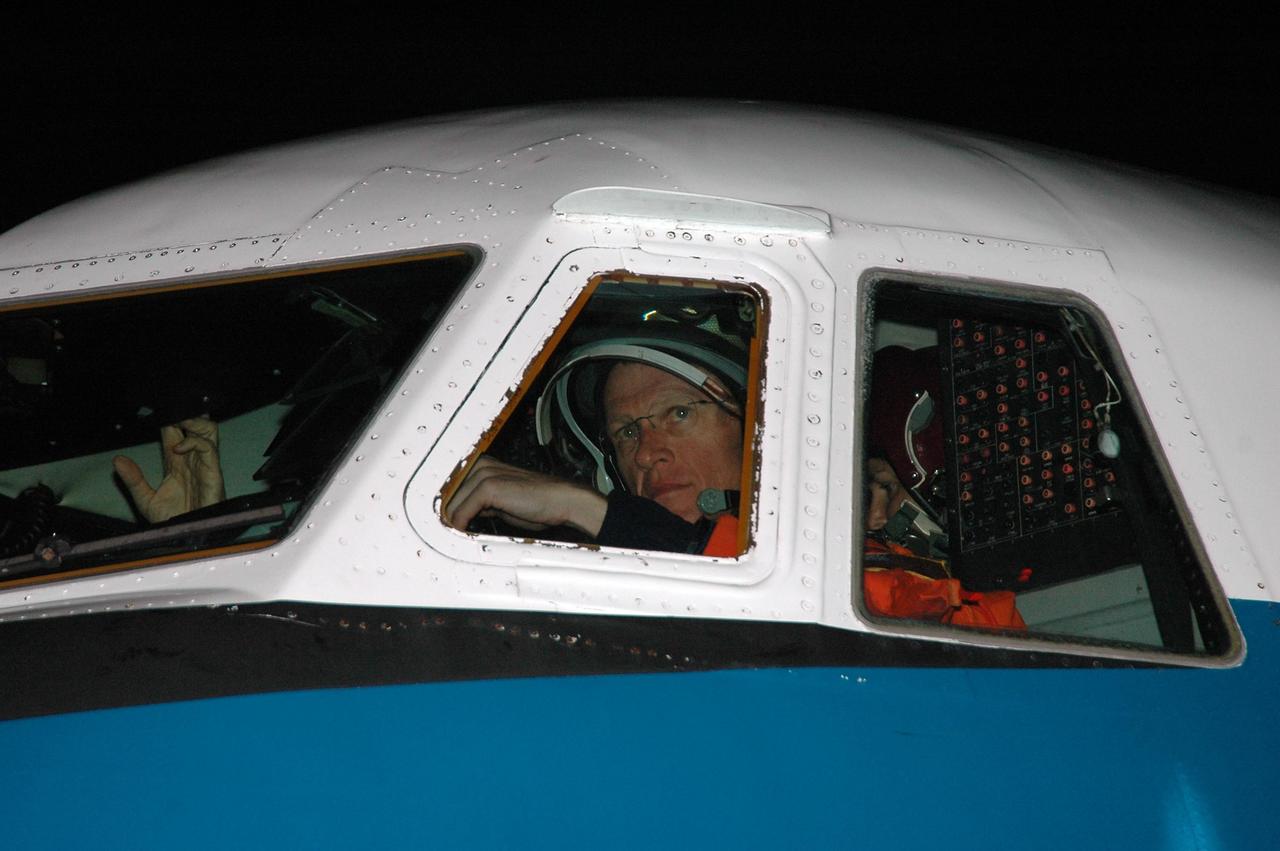 KENNEDY SPACE CENTER, FLA. -  STS-115 Commander Brent Jett is seen at the controls of the Shuttle Training Aircraft which he will fly to practice landing the shuttle.  STA practice is part of launch preparations.  The STA is a Grumman American Aviation-built Gulf Stream II jet that was modified to simulate an orbiter’s cockpit, motion and visual cues, and handling qualities. In flight, the STA duplicates the orbiter’s atmospheric descent trajectory from approximately 35,000 feet altitude to landing on a runway. Because the orbiter is unpowered during re-entry and landing, its high-speed glide must be perfectly executed the first time.  Mission STS-115 is scheduled to lift off about 4:30 p.m. Aug. 27.  The crew will deliver and install the P3/P4 segment to the port side of the integrated truss system on the International Space Station.  The truss includes a new set of photovoltaic solar arrays.  When unfurled to their full length of 240 feet, the arrays will provide additional power for the station in preparation for the delivery of international science modules over the next two years.  The mission is expected to last 11 days and includes three scheduled spacewalks.   Photo credit: NASA/Kim Shiflett