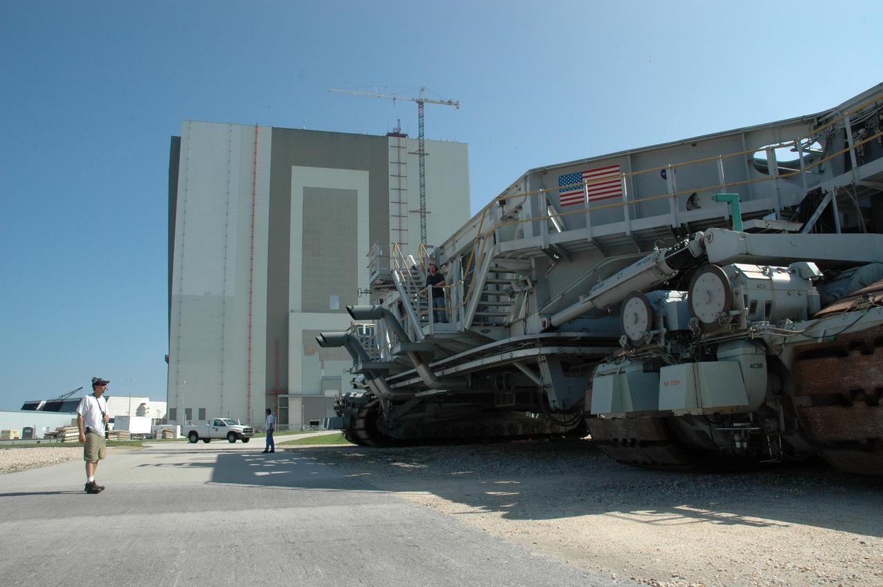 KENNEDY SPACE CENTER, FLA. -  Crawler-transporter No. 1 sits outside the Vehicle Assembly Building.  Workers will be driving the crawler to test it before it is needed to roll back Space Shuttle Atlantis from Launch Pad 39B. The rollback will be determined by the mission management team based on information about Hurricane Ernesto and its path through Florida. Atlantis has been poised on Launch Pad 39B for liftoff on mission STS-115 to the International Space Station to deliver the P3/P4 truss segment.  Photo credit: NASA/Jack Pfaller