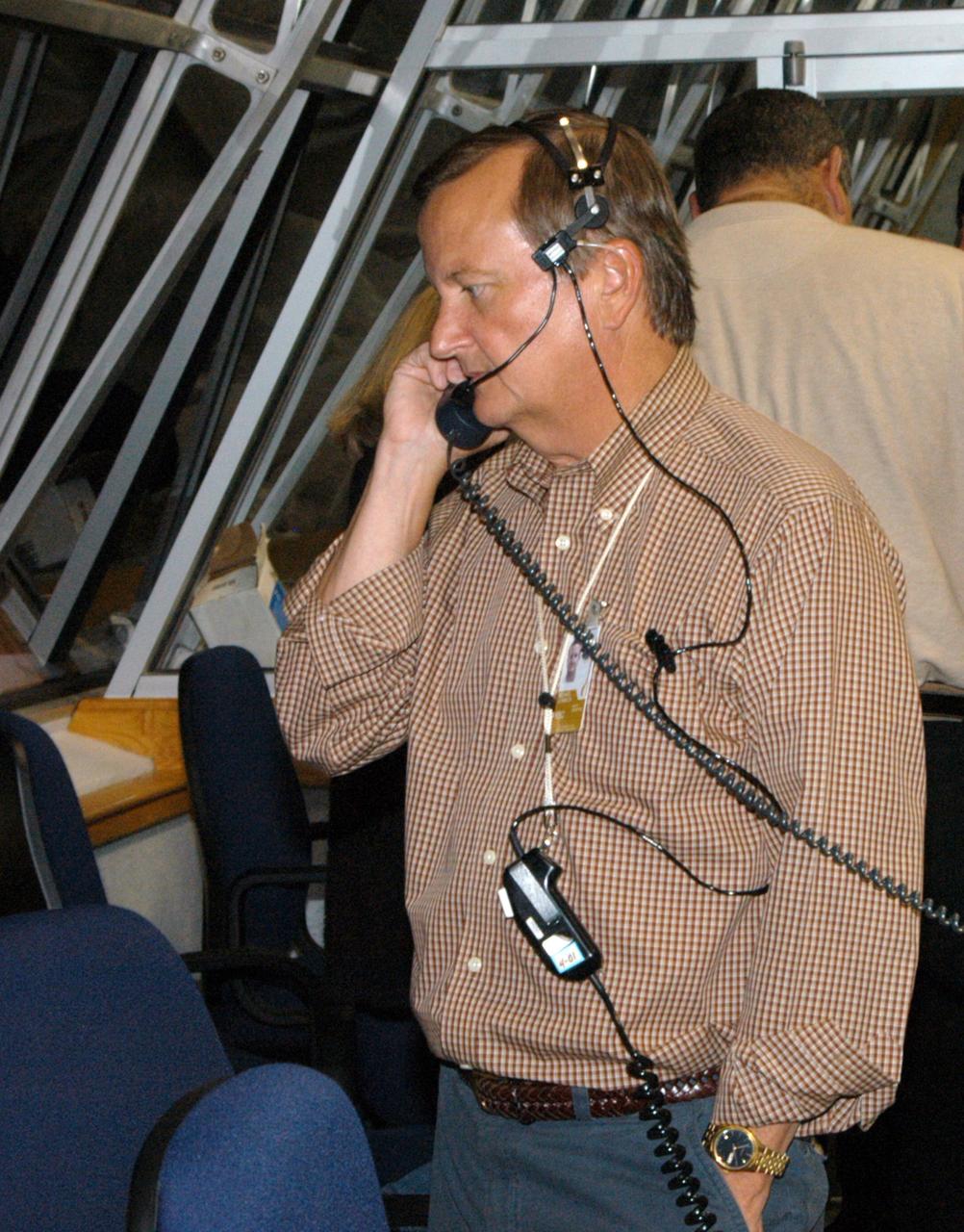 KENNEDY SPACE CENTER, FLA. -    Inside the Launch Control Center at NASA's Kennedy Space Center, Shuttle Launch Director Mike Leinbach informs the launch team of the decision to reverse the rollback of Space Shuttle Atlantis and return to Launch Pad 39B.  Photo credit: NASA/George Shelton