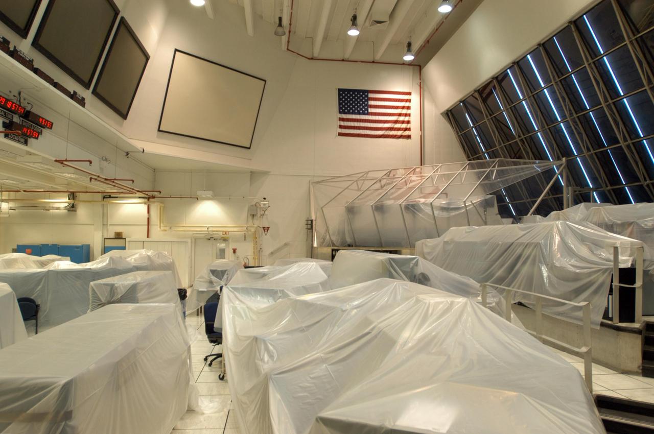 KENNEDY SPACE CENTER, FLA. -    Equipment in areas of the Launch Control Center at NASA's Kennedy Space Center are wrapped in protective covers for the arrival of Tropical Storm Ernesto in Central Florida.  The storm is forecast to be bringing 58-mph to 70-mph winds in the next 24 hours.   Photo credit: NASA/George Shelton
